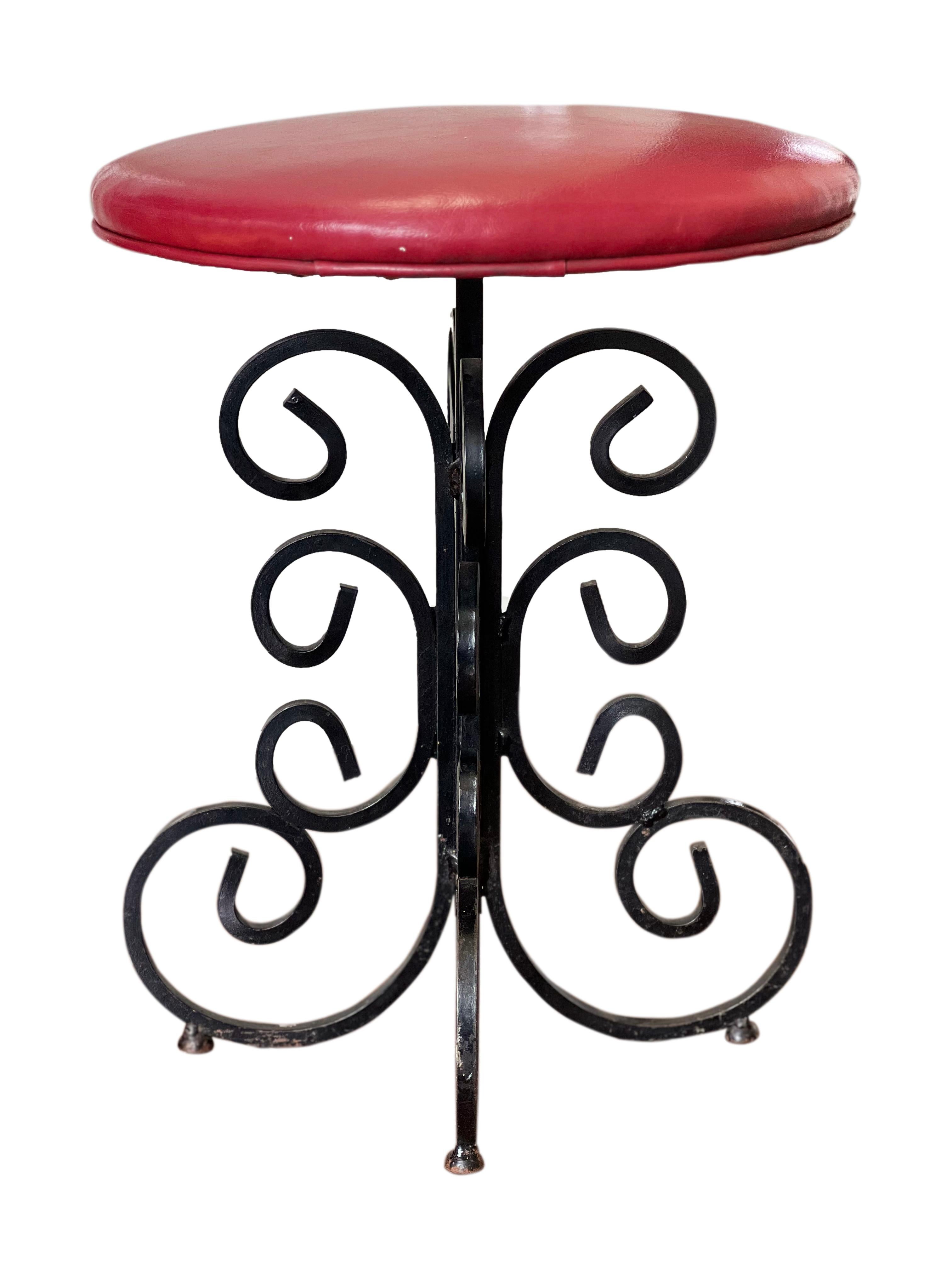 Mid century Arthur Umanoff wrought iron stools, set of 4.

The stools have lots of character with ornate scroll work. The stools are in good condition but reupholstering is recommended.  May be easily reupholstered in your fabric of choice. Perfect