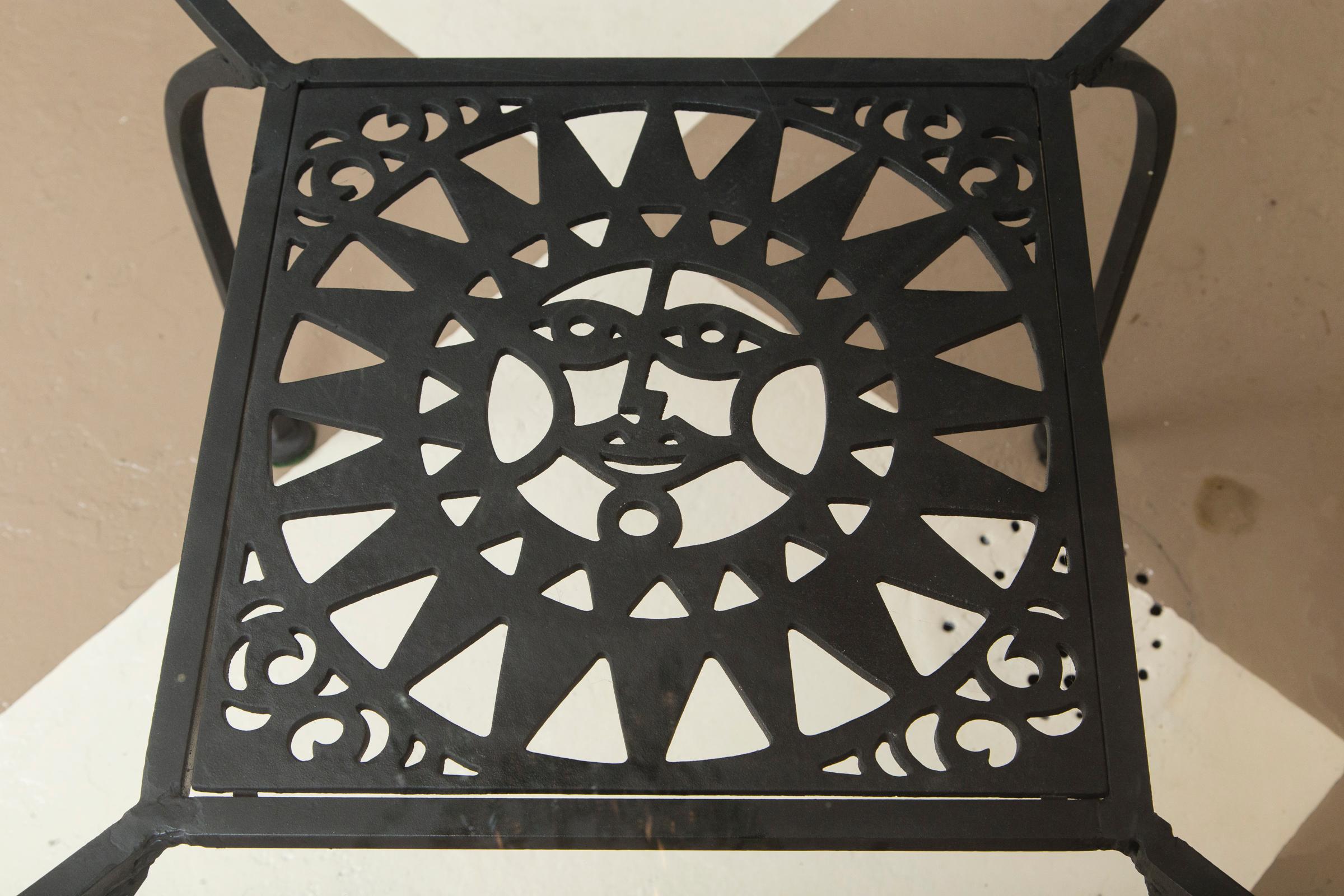 wrought iron table and four chairs