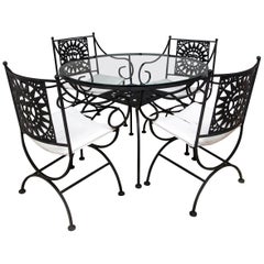 Arthur Umanoff Wrought Iron Sun Table and Four Chairs