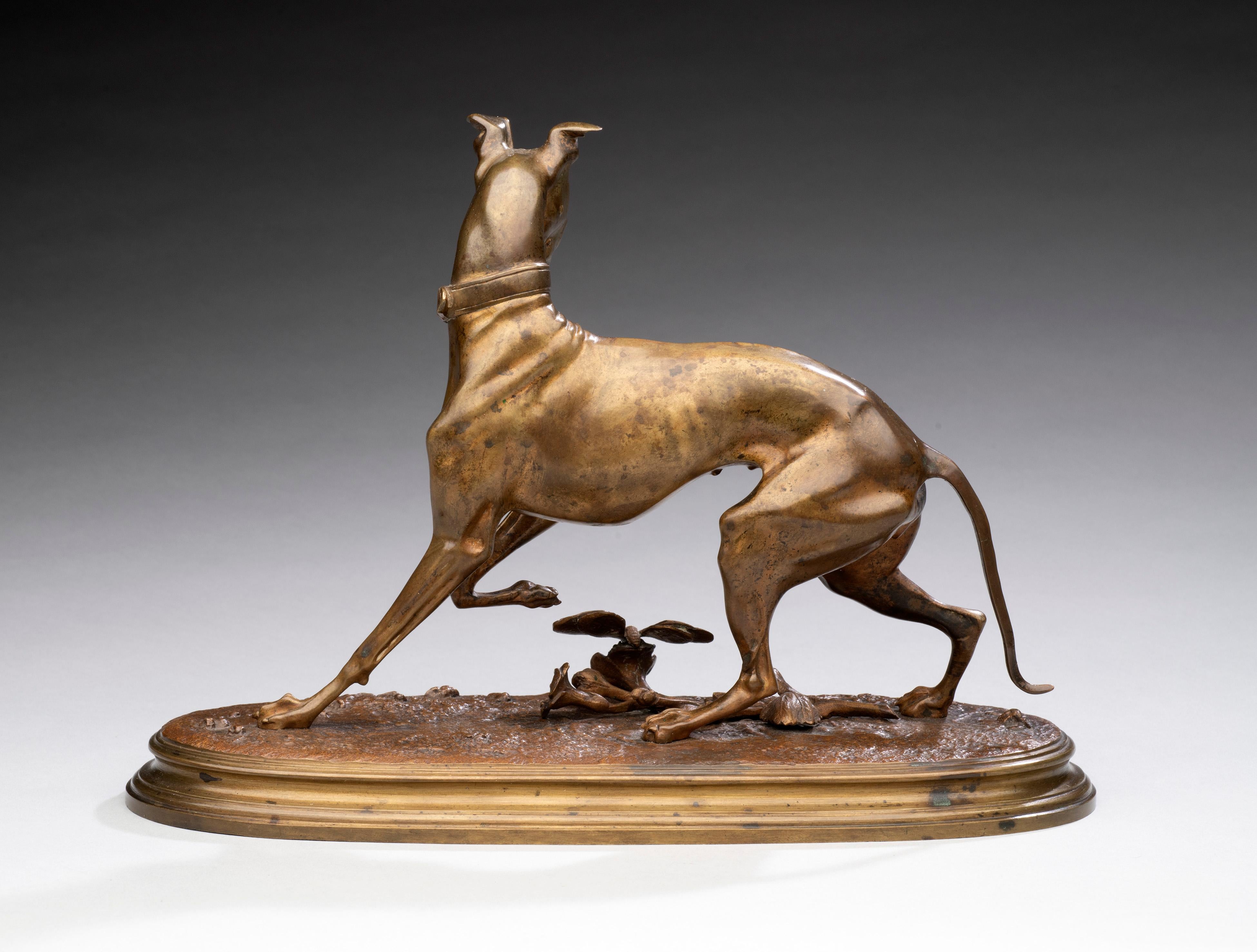 Perro antiguo de bronce 