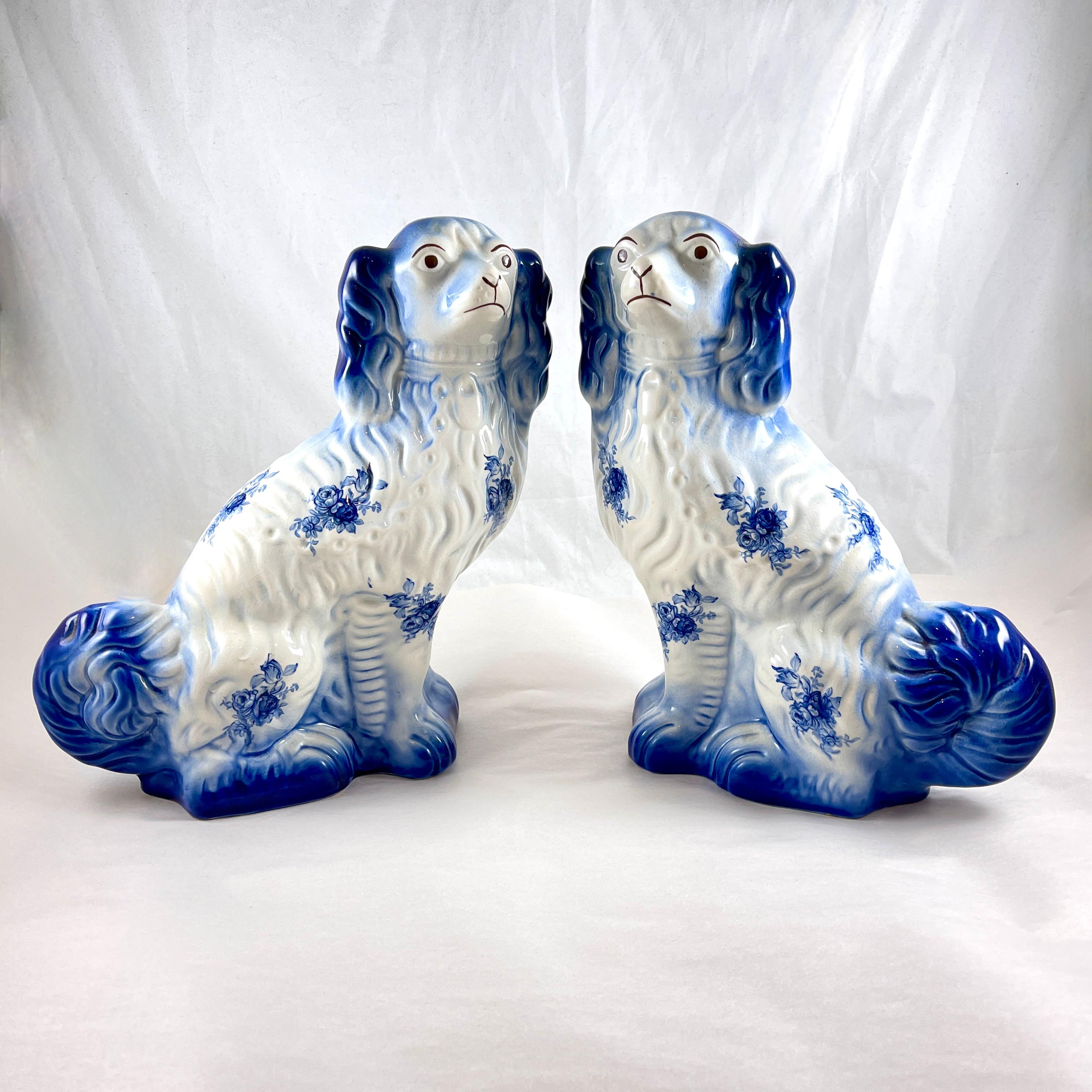 A pair of Cavalier King Charles Ironstone Spaniels made by Arthur Wood, Staffordshire, England, circa 1920s.   
 
Arthur Wood Pottery was produced in Stoke-on-Trent, in the Staffordshire region of England. Initially founded in 1884 as Capper & Wood,