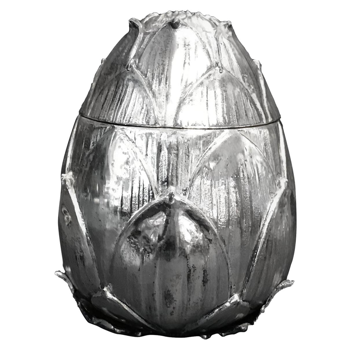 Artichoke ice bucket designed by Mauro Manetti, circa 1970 (productions realized after the 1980s have a white lacquered metallic inner part instead). Outside made of silverplated cast aluminum and a metallic inner part, typical of the production of