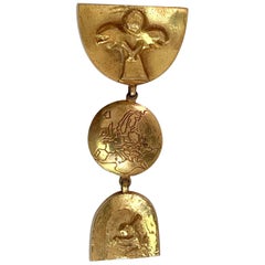 Spilla articolata in bronzo "Pergatoire" di Line Vautrin