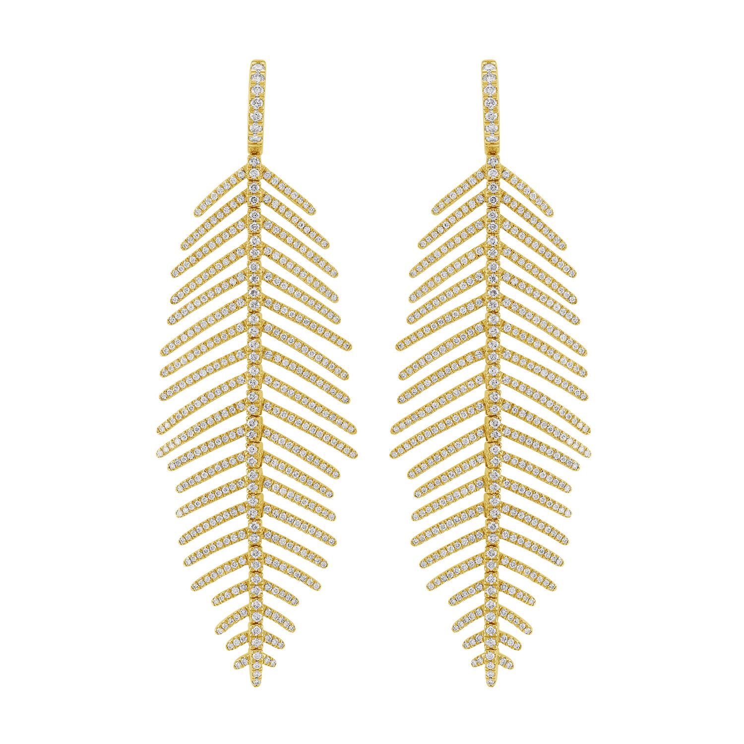 Crafted with intricate leaf motifs, these dangle earrings feature a pave diamond setting that sparkles with every movement. The 14k yellow gold design adds warmth, while the elongated form creates an elegant statement piece.

Metal Details:
14KT