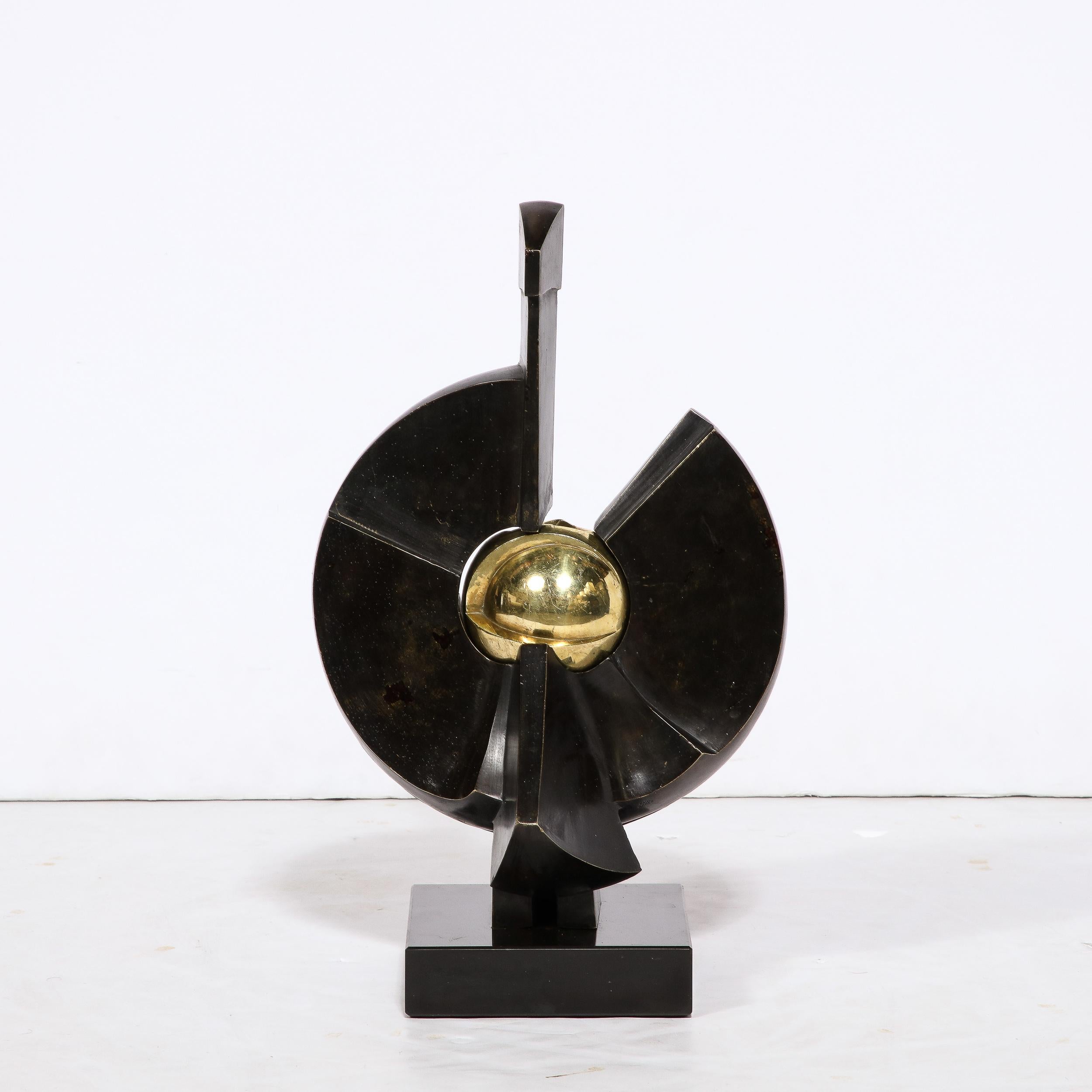This stunning and graphic modernist sculpture was realized by Paul Gonez in France circa 1980. Realized in the manner of Bernard Rosenthal and other great modernist sculptors of the era, eatures a double patina bronze cast consisting of curvilinear