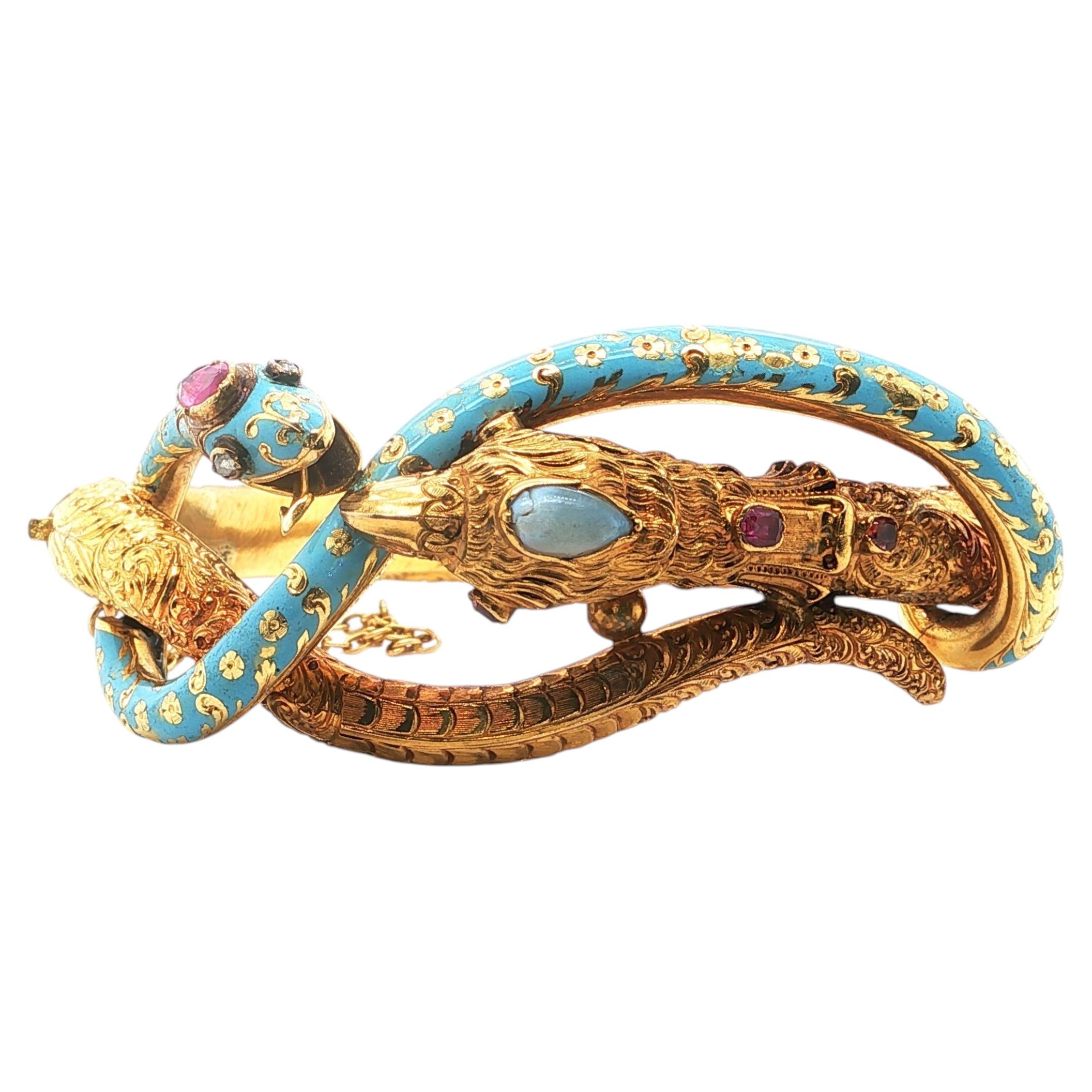 Bracciale articolato con un serpente e un'aquila, pietre preziose e diamanti in vendita