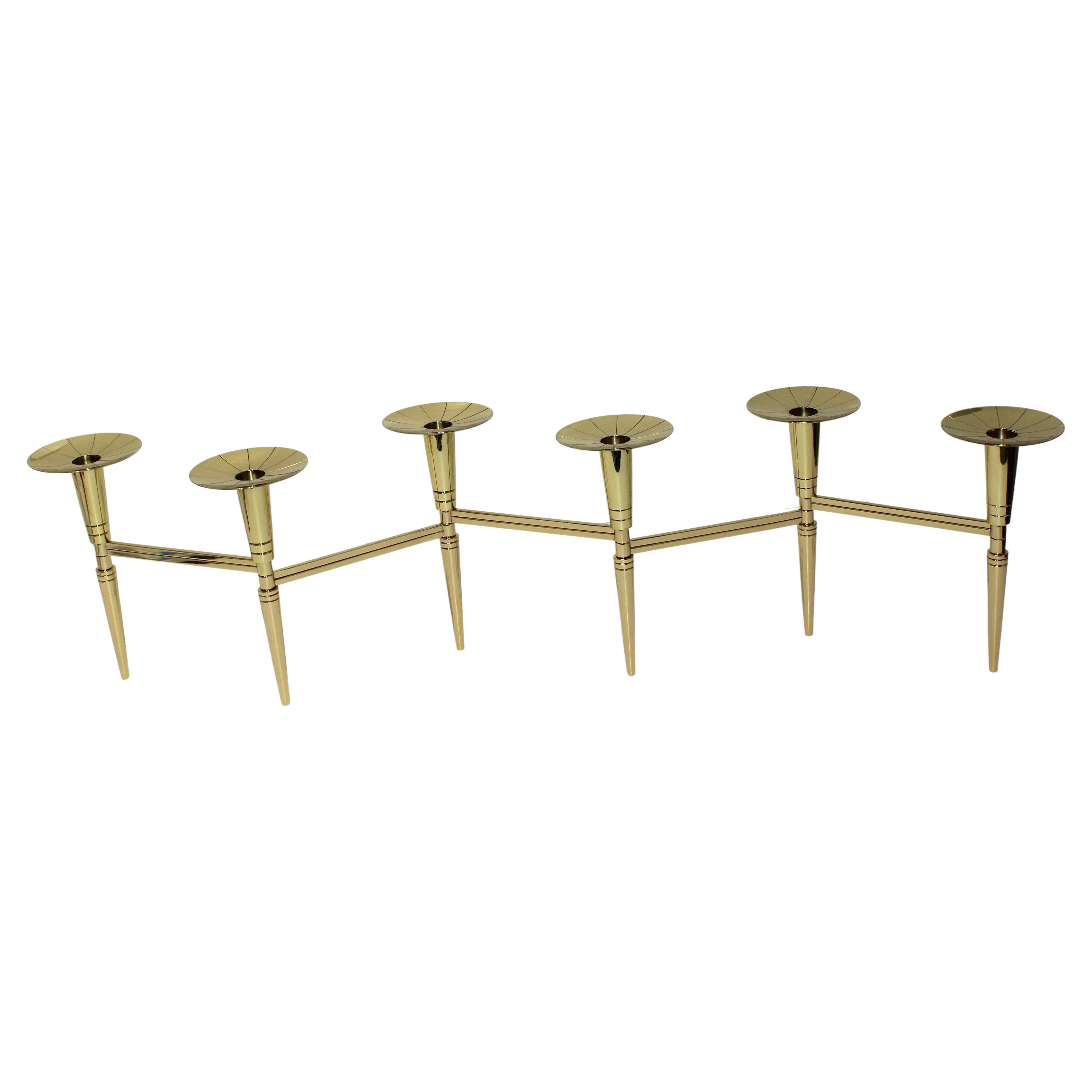 Articulated Brass Candlesticks by Tommi Parzinger