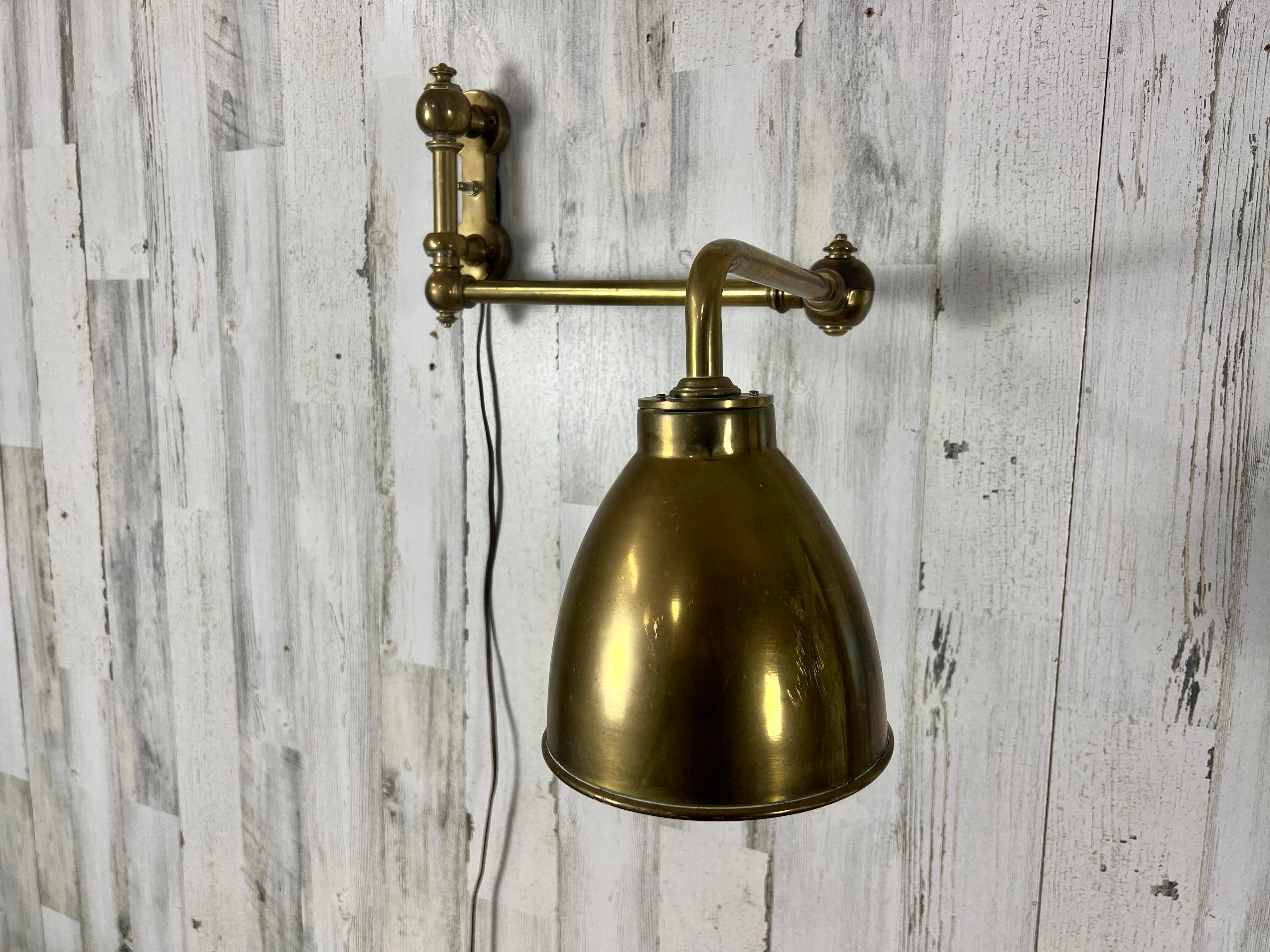Unknown  Articulated Brass Sconce For Sale