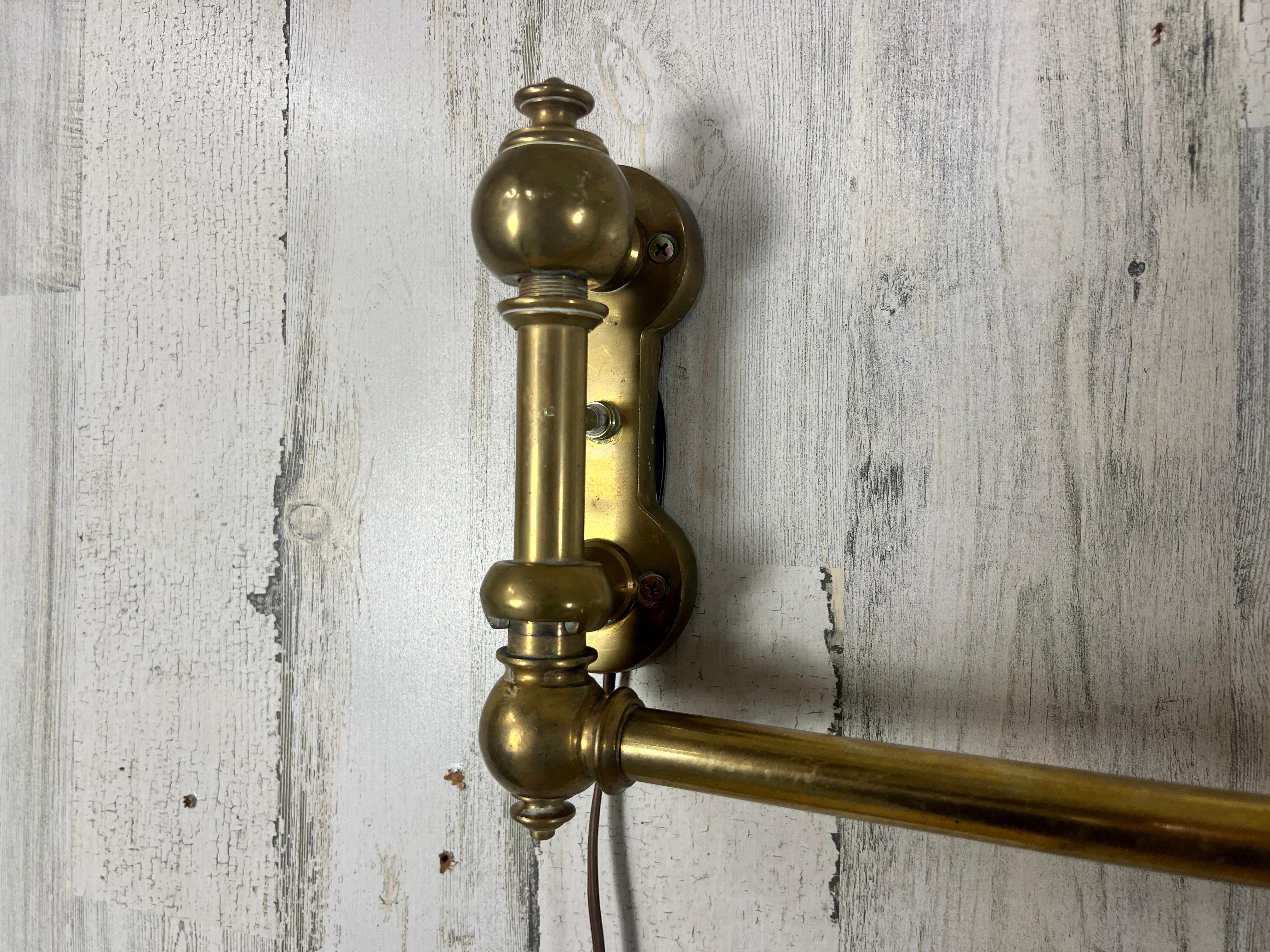 20th Century  Articulated Brass Sconce For Sale