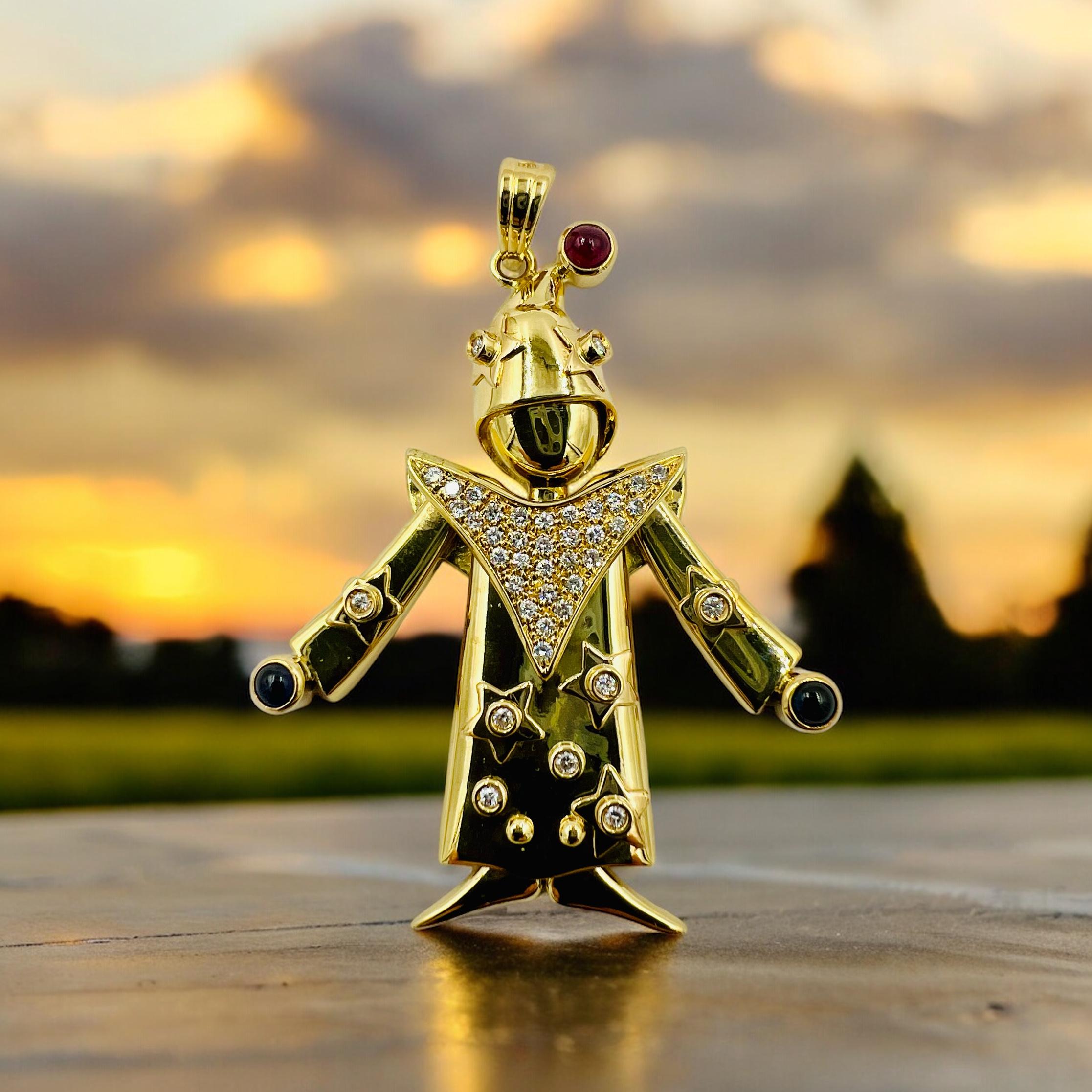 Articulated diamond ruby sapphire yellow gold clown pendant, circa 1990s.

This Articulated Diamond Ruby Sapphire Yellow Gold Clown Pendant is not just a piece of jewelry, it is a work of art that stands out from the crowd. Its intricate design