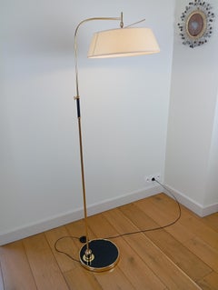 Articulated floor lamp, by R. Lunel, circa 1950