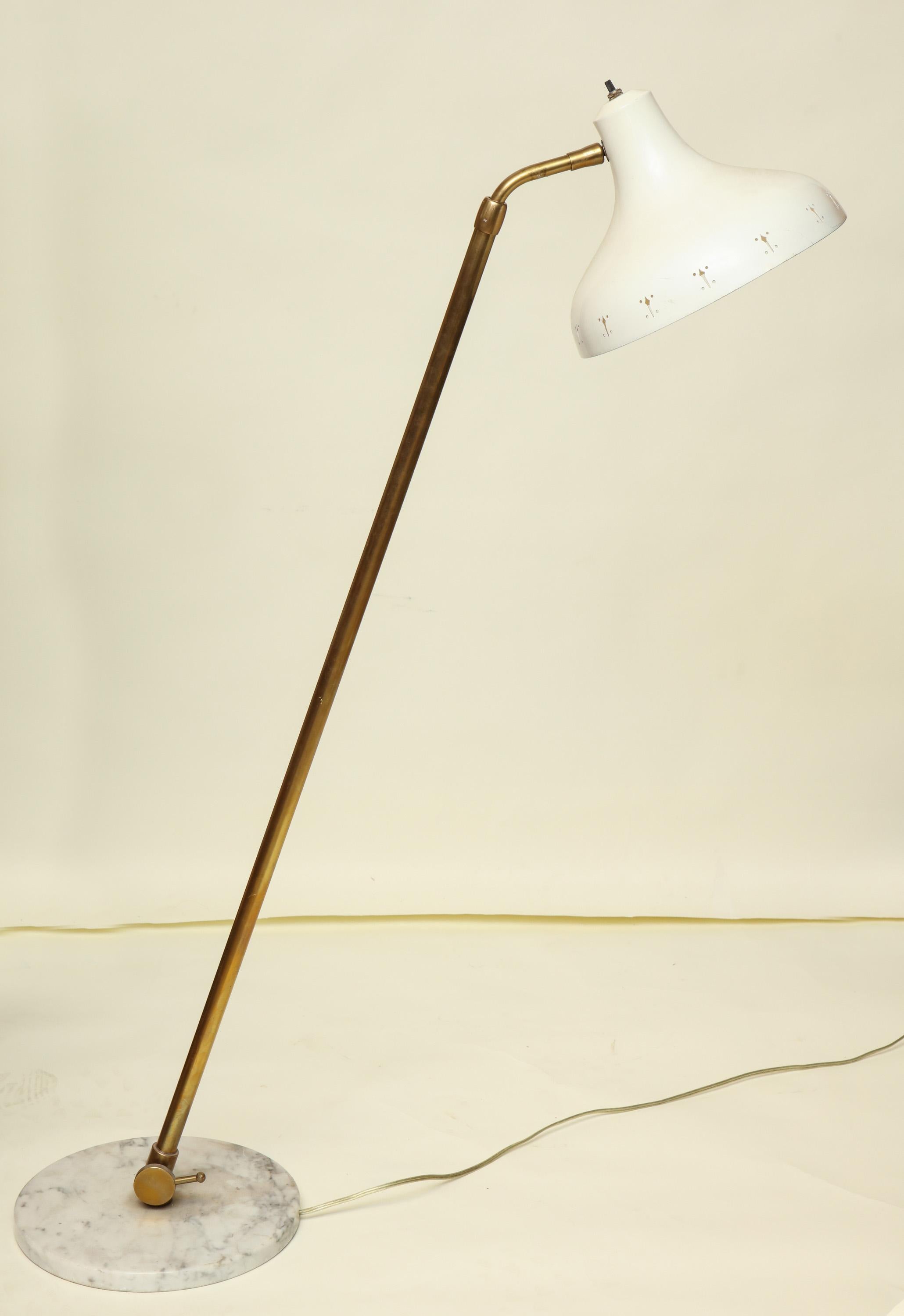 An articulated floor lamp Mid-Century Modern shade arm and height adjusts from 43