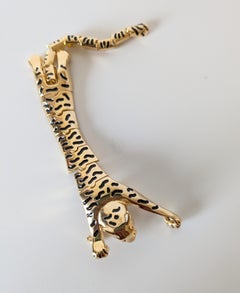 Articulated Panther Brooche with enamel paint and gold plated creation