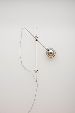 Articulated Pole Wall Sconce in Polished Nickel by The Light Factory