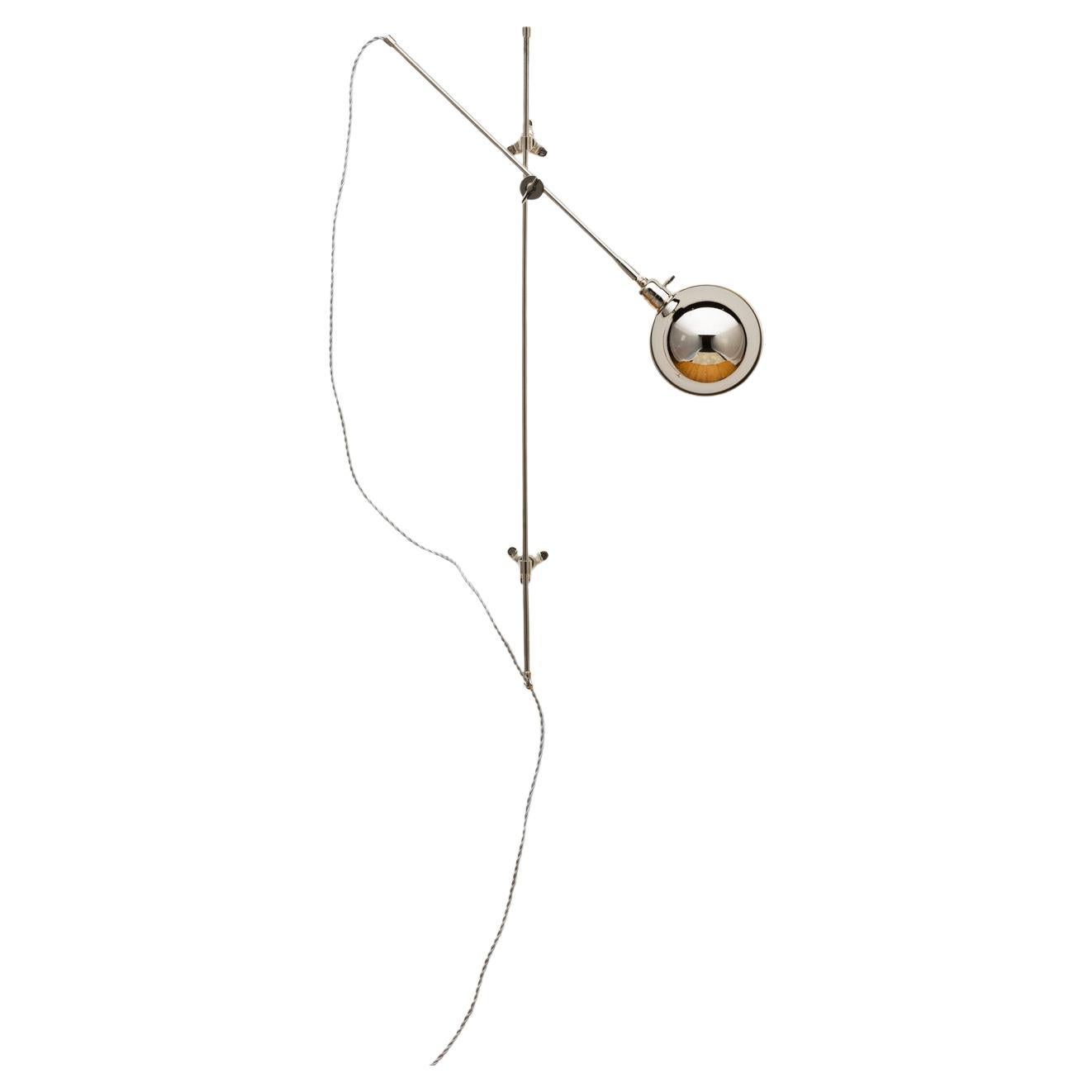Articulated Pole Wall Sconce in Polished Nickel by The Light Factory