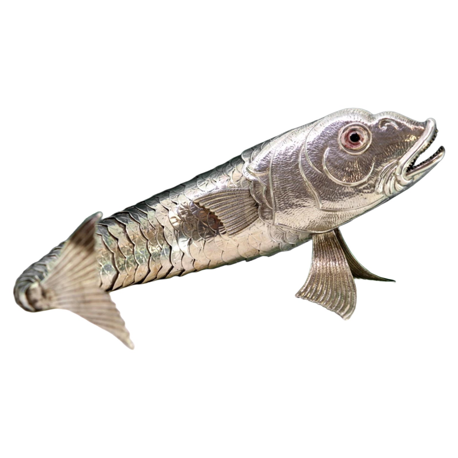 Articulated silver fish with reliefs and applications For Sale