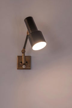 Articulated Stilnovo wall light. Italy c1950