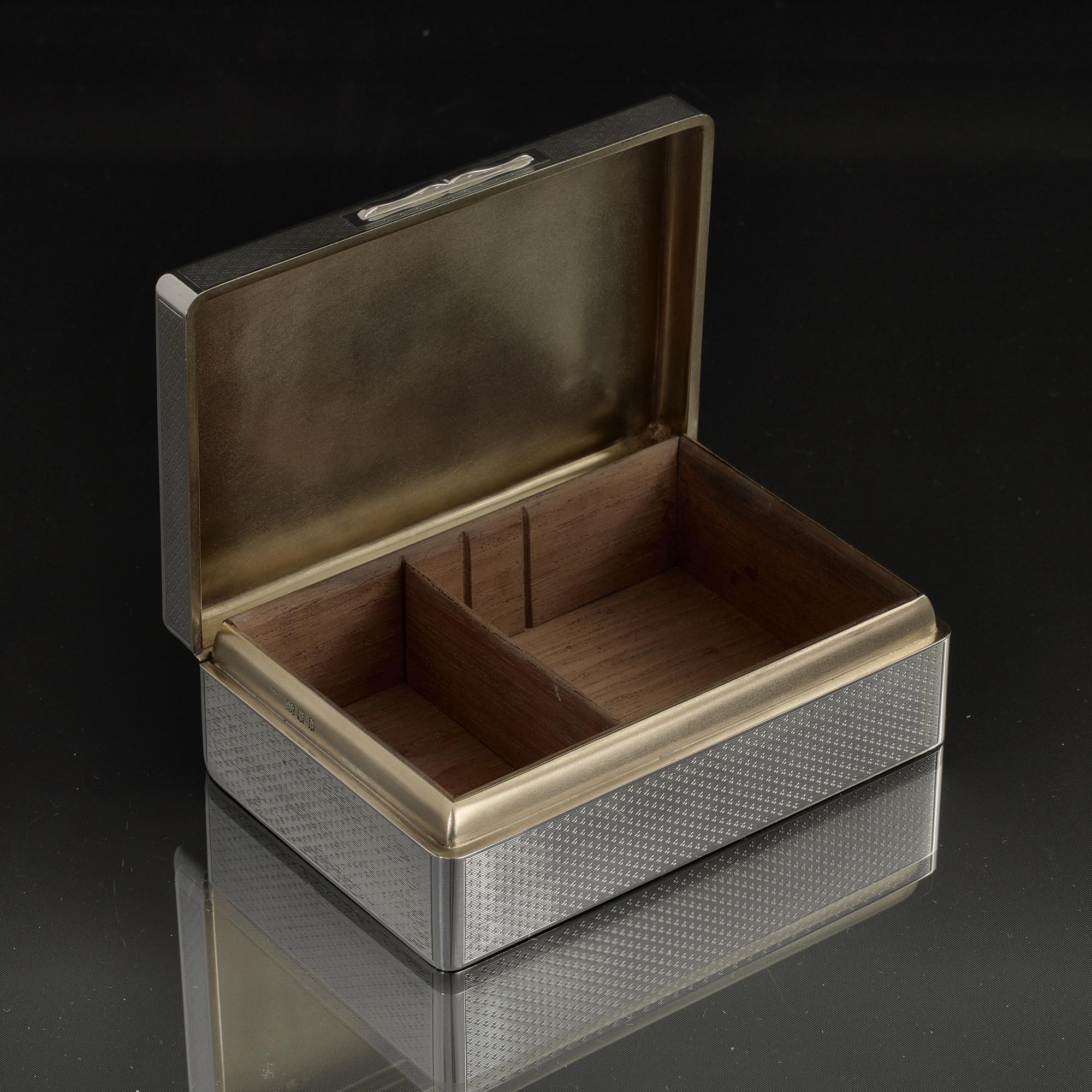 British Engine-turned silver cigarette box