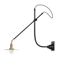 Articulating & Adjustable O.C. White Fixture Customized for O.C. White Co.