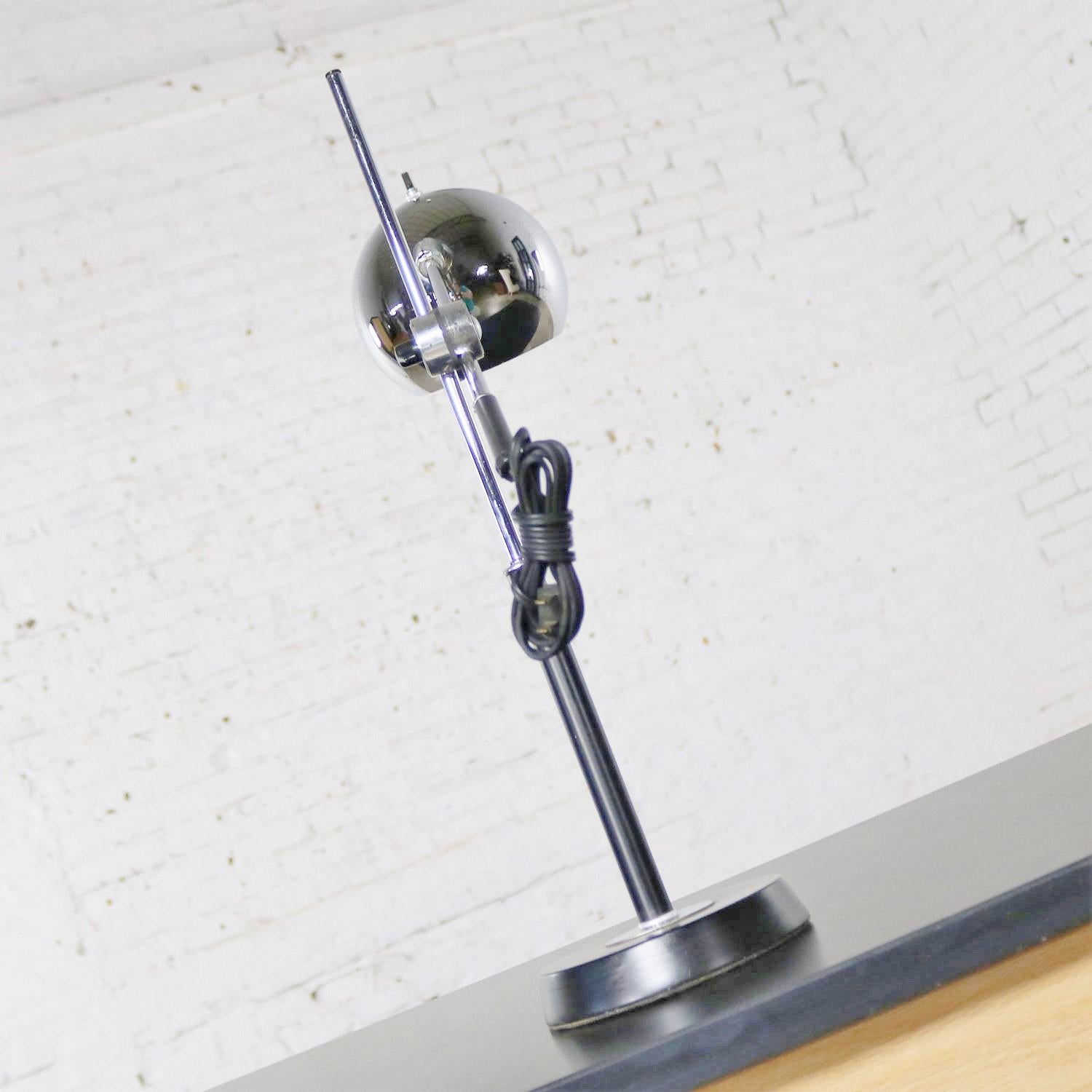 Mid-Century Modern Articulating Chrome and Black Ball Orb Task Lamp Attributed to Robert Sonneman