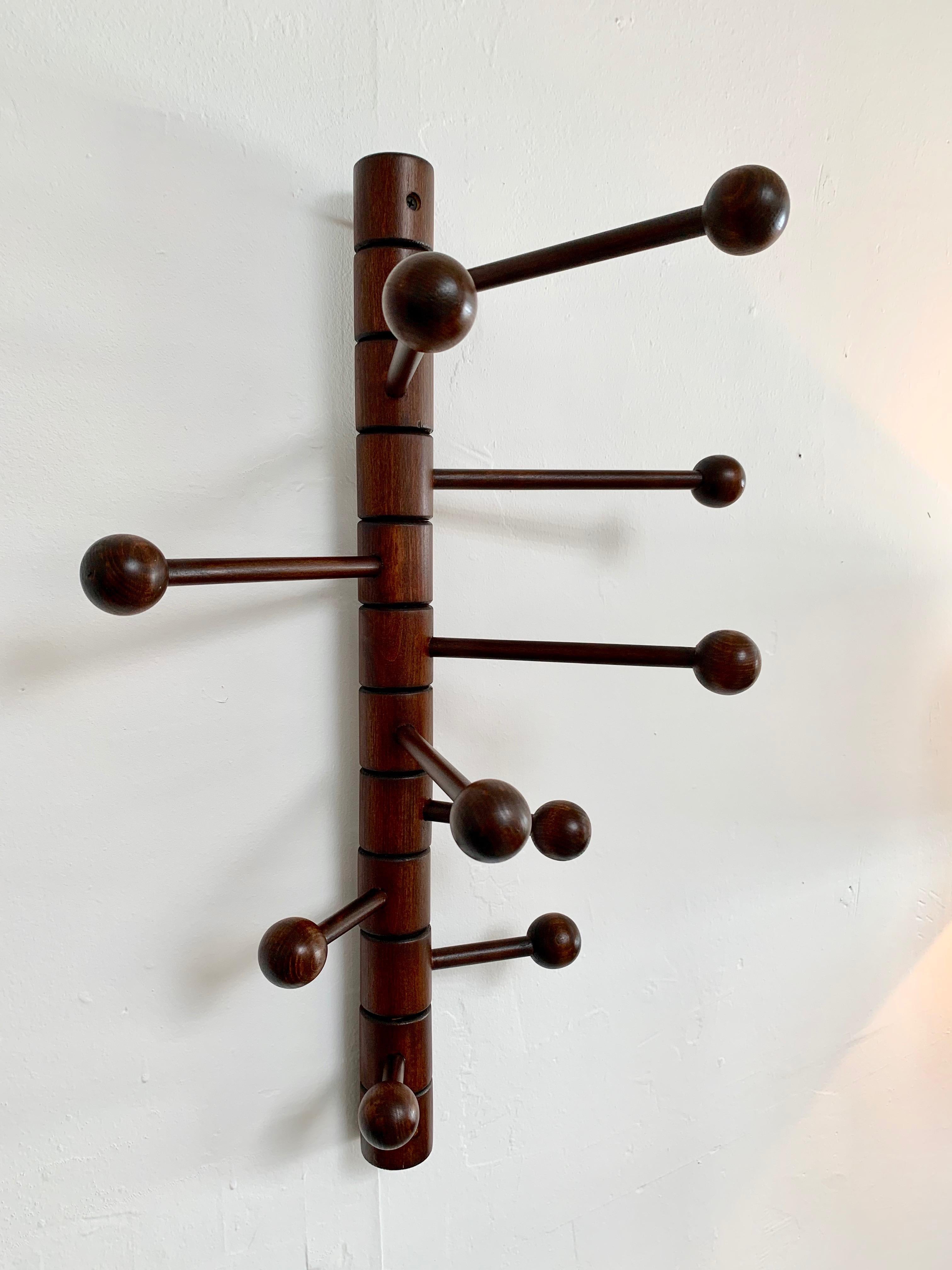 Articulating wood coat rack by Merit, Los Angeles. Handmade here in LA. Super functional coat rack with 10 adjustable arms that rotate 180 degrees. Able to choose custom finishes.

Lead time is 6-8 weeks.