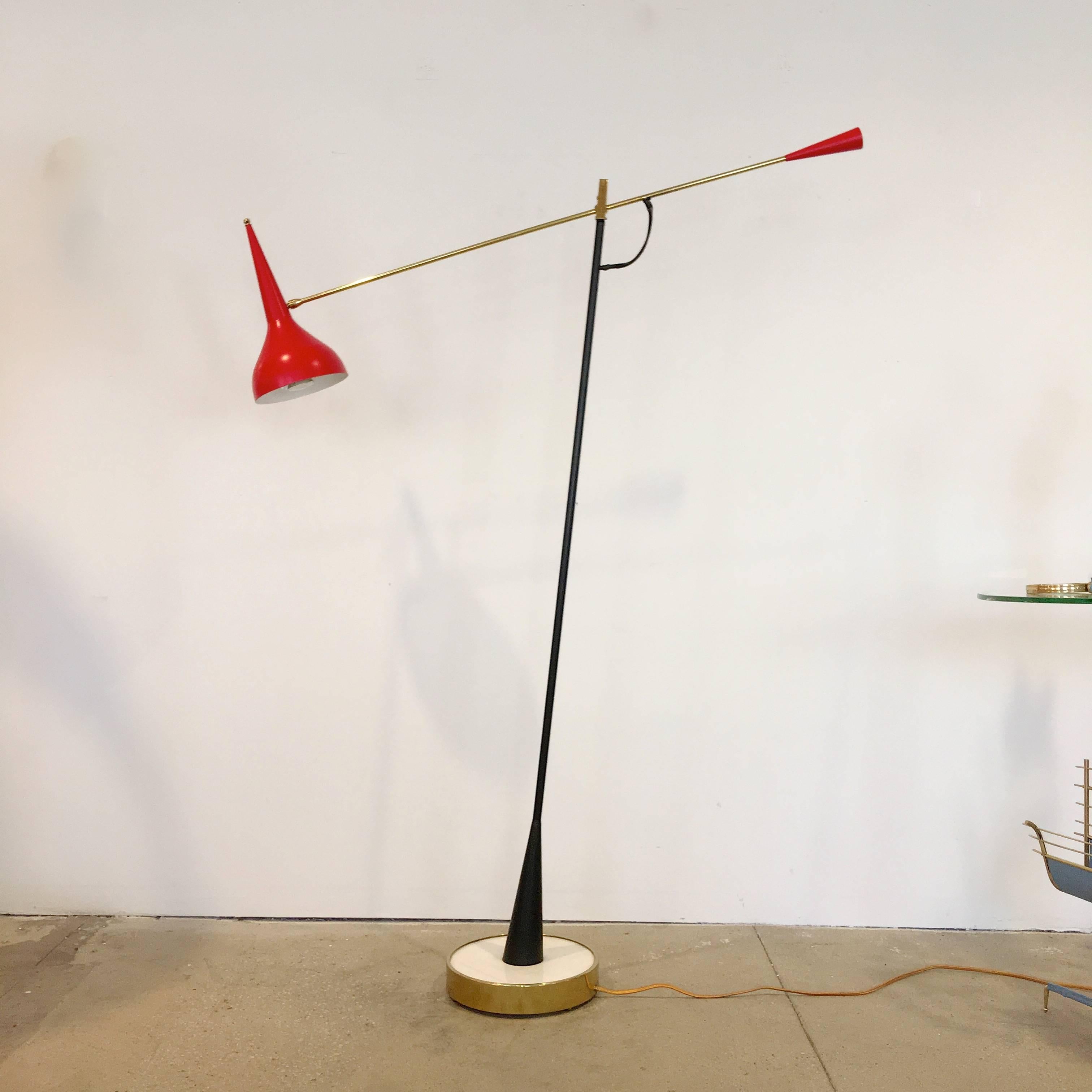 Crafted entirely by hand by our own master metalsmith in our workshop/studio is this articulating floor lamp the design of which was inspired by elements of our favorite Italian lighting from the 1950s including but not limited to Oscar Torlasco,