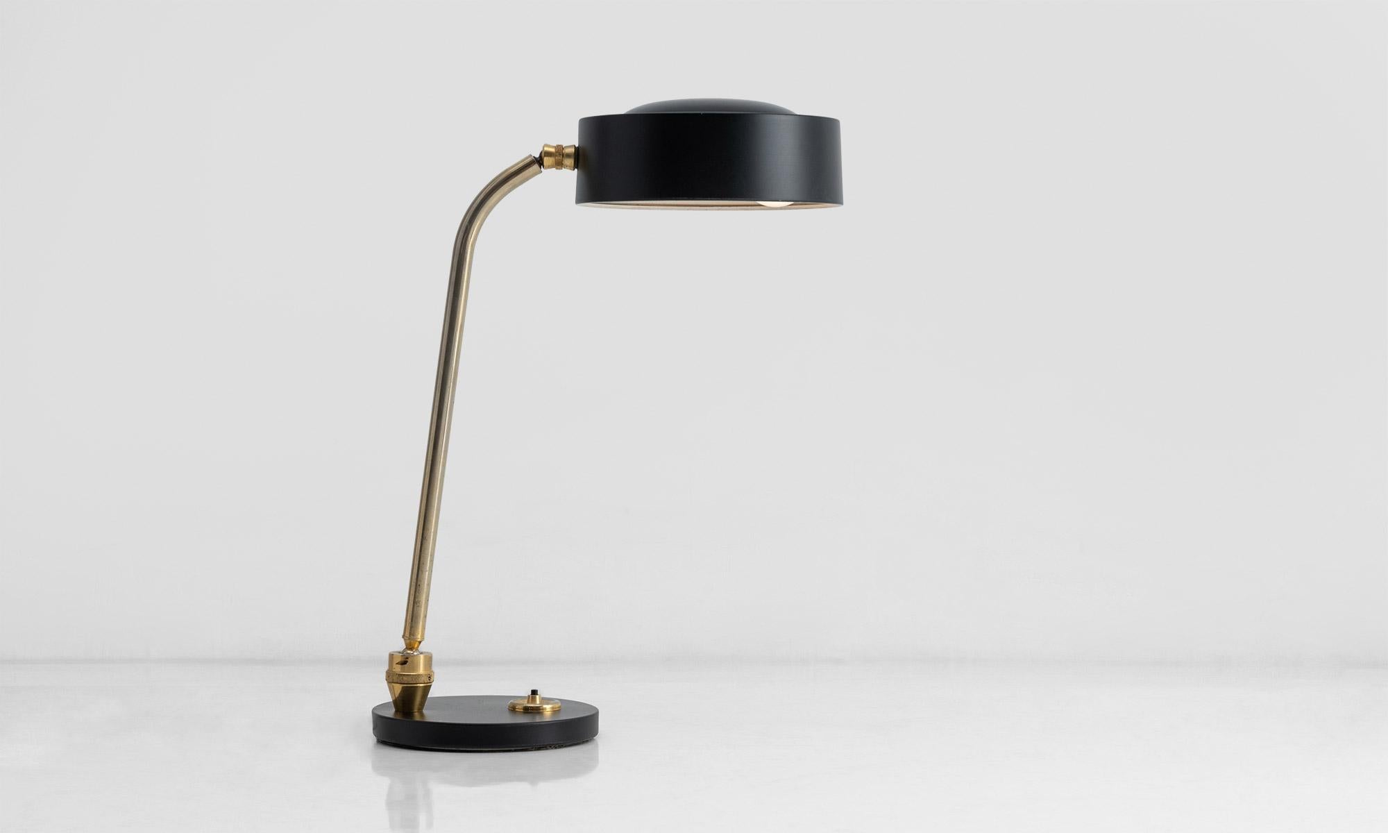 Articulating desk lamp by Charlotte Perriand

France Circa 1950

Produced by Jumo, with circular black metal shade, articulating bent brass arm and black metal base.

8.25” W x 12.5” D x 20” H (as shown).