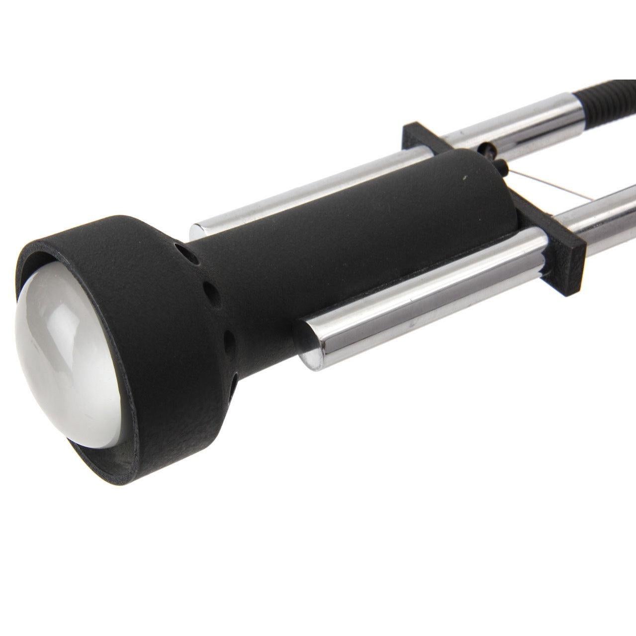 An articulating Italian desk lamp with gooseneck arms and a counterweight/wire telescoping system attached to two chrome supports on a marble base.
