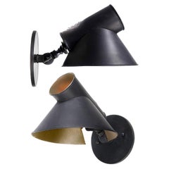 Articulating Industrial Sconce With Unique Candle Shade