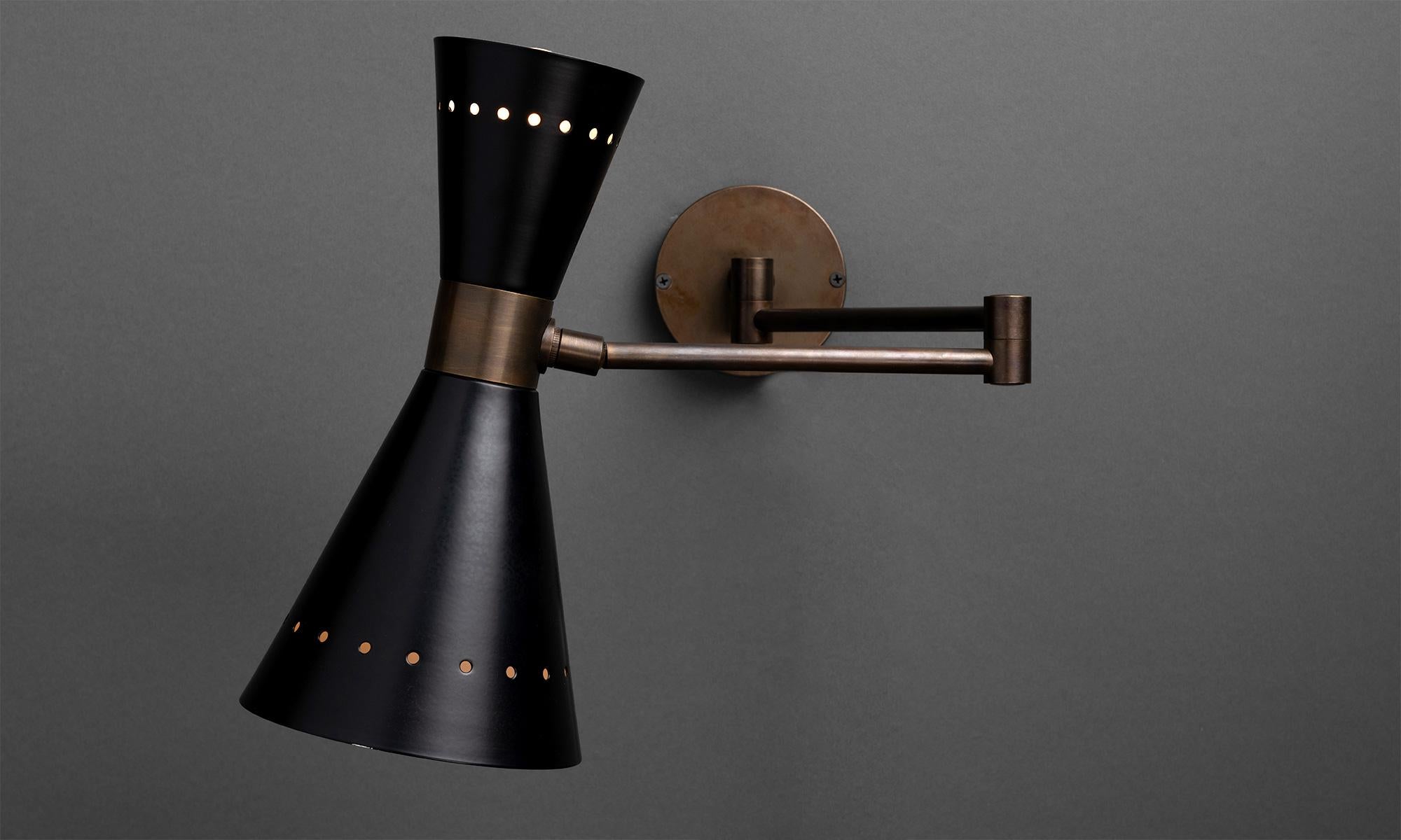 *Please Note: This fixture is made in Italy, and comes newly wired (eu wiring). It is not UL Listed. Standard Lead Time is 4-6 Weeks*

*Listing is per unit, lights are sold individually*

Articulating Sconce

Made in Italy

Double cone black metal