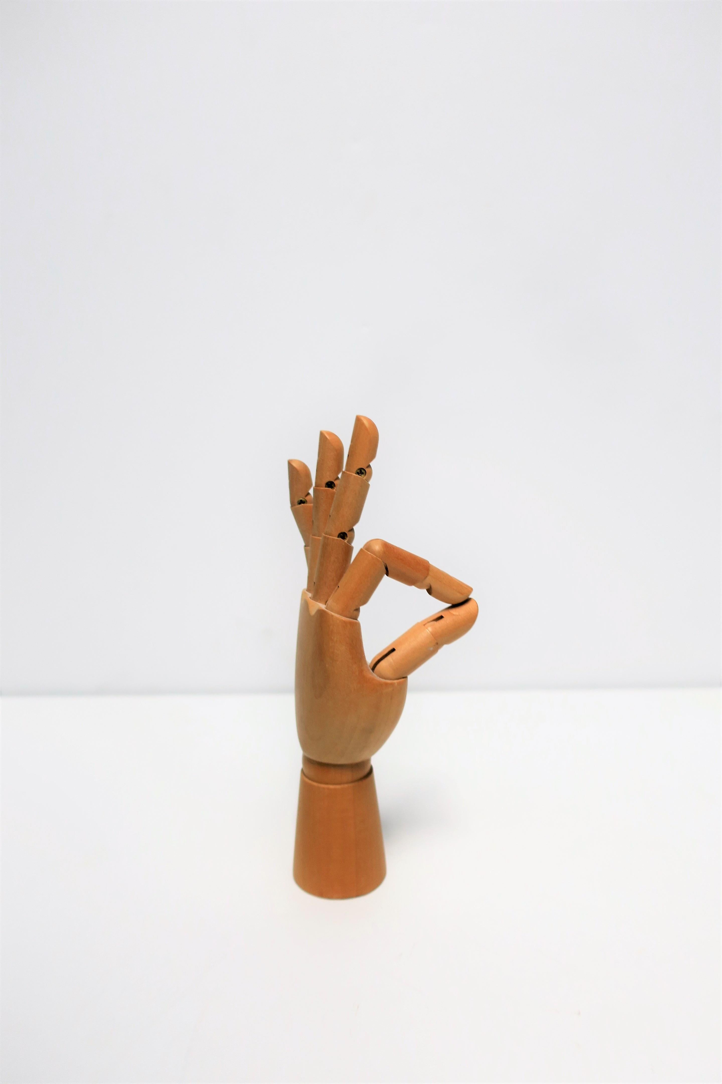 wooden hand sculpture