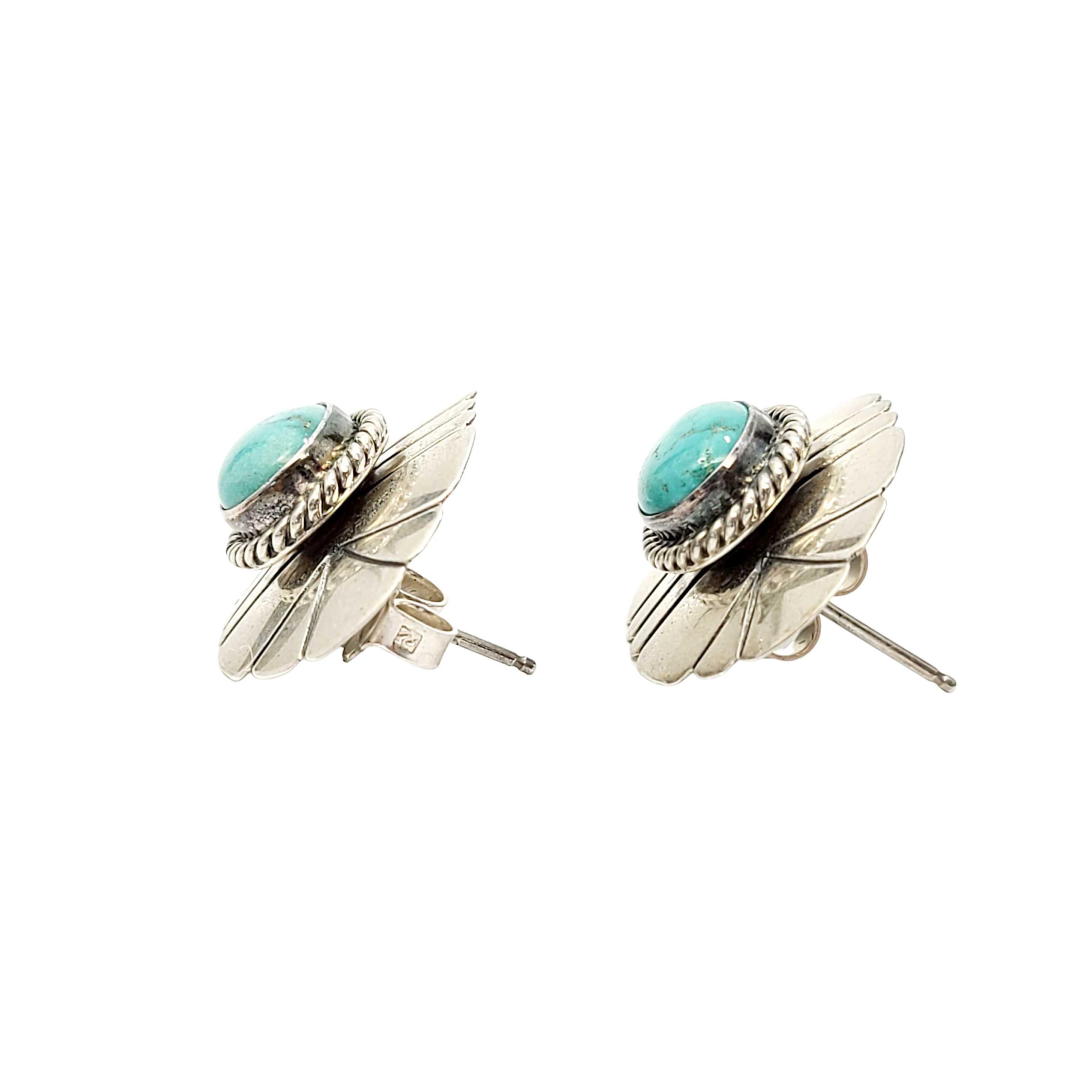 Sterling silver and turquoise earrings by Native American Navajo artisan, Artie Yellowhorse.

Artie Yellowhorse is known for her contemporary designs combined with exceptional craftsmanship and quality materials. Her pieces are truly wearable art.
