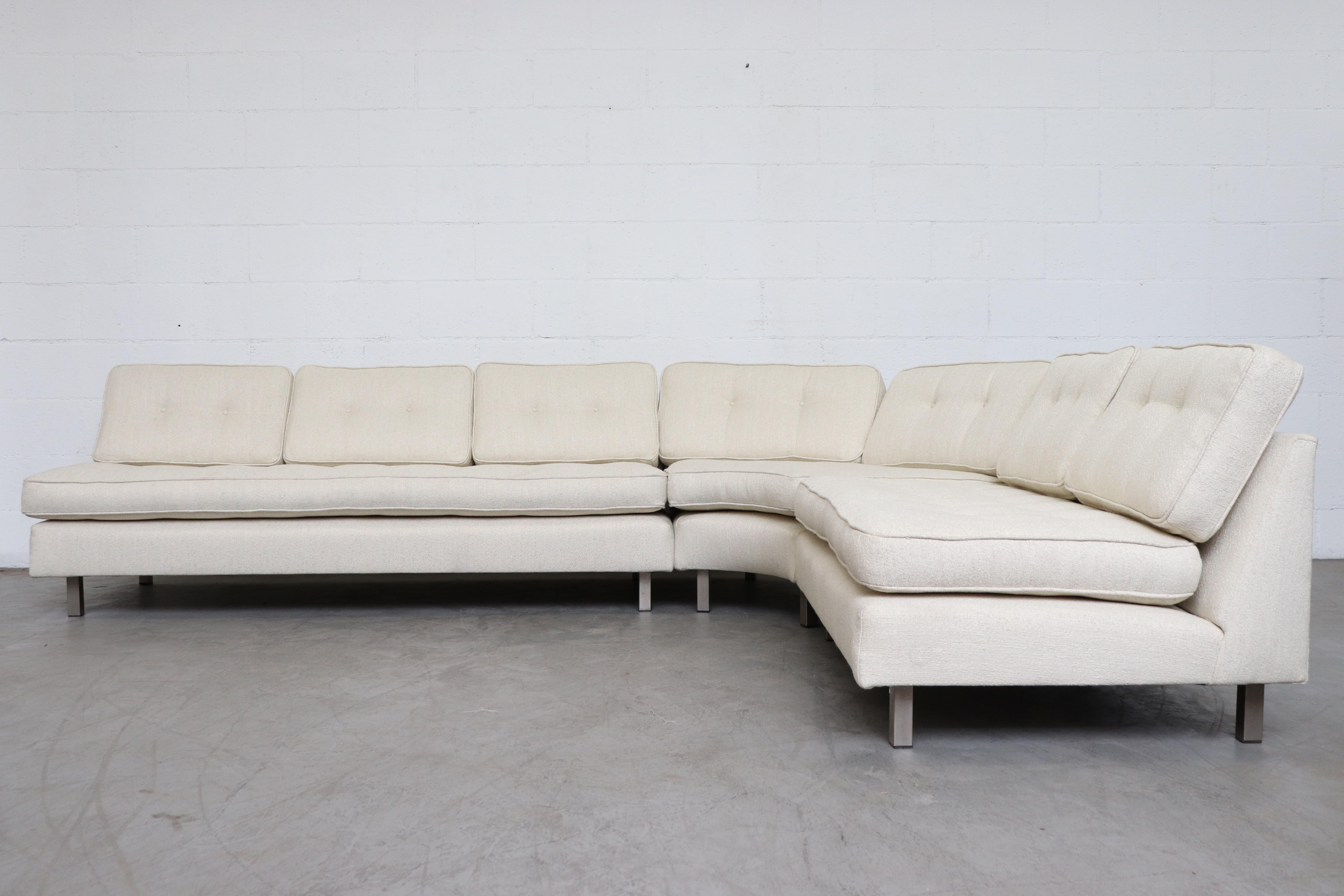 Artifort 3-piece sectional sofa. Newly upholstered in bone white fabric. Frame in original condition with wear consistent with its age and use. A similar rust leather sectional is also available and listed separately (LU9224818214).