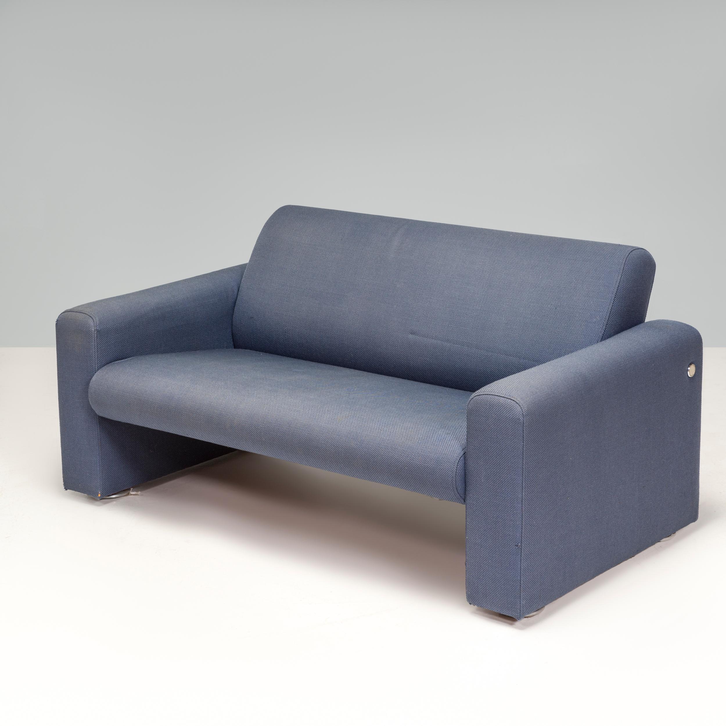 Originally designed by the Artifort design group in 1987, the 691 sofa has been in production ever since making it a true classic of the collection.

Fully upholstered in a blue-grey coloured fabric, the sofa has a sleek a sophisticated aesthetic