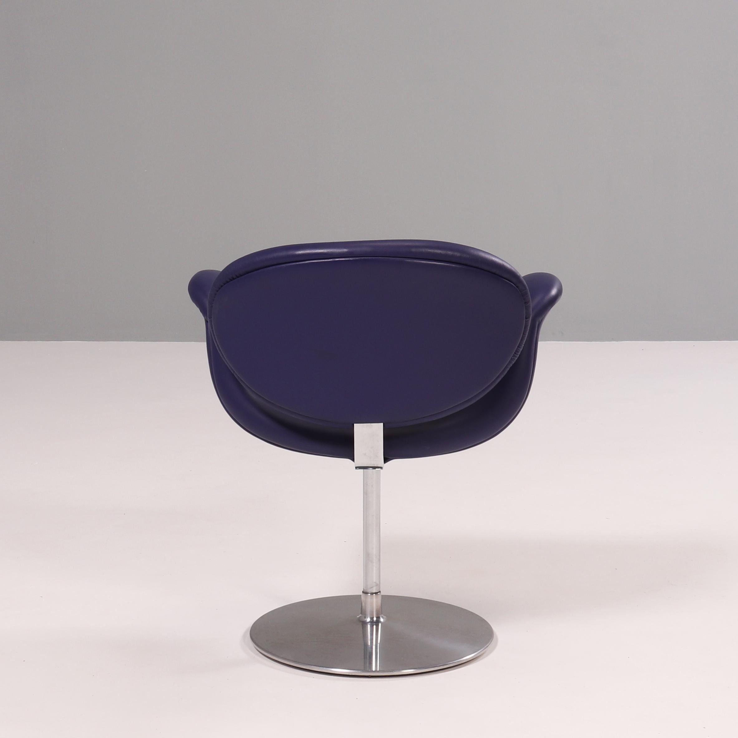Originally designed by Pierre Paulin in 1965, the Little Tulip chair is a design icon.

Inspired by the flower, the chair has a Tulip-esque silhouette with a petal shaped seat which curves to create armrests.

Upholstered in purple leather, the