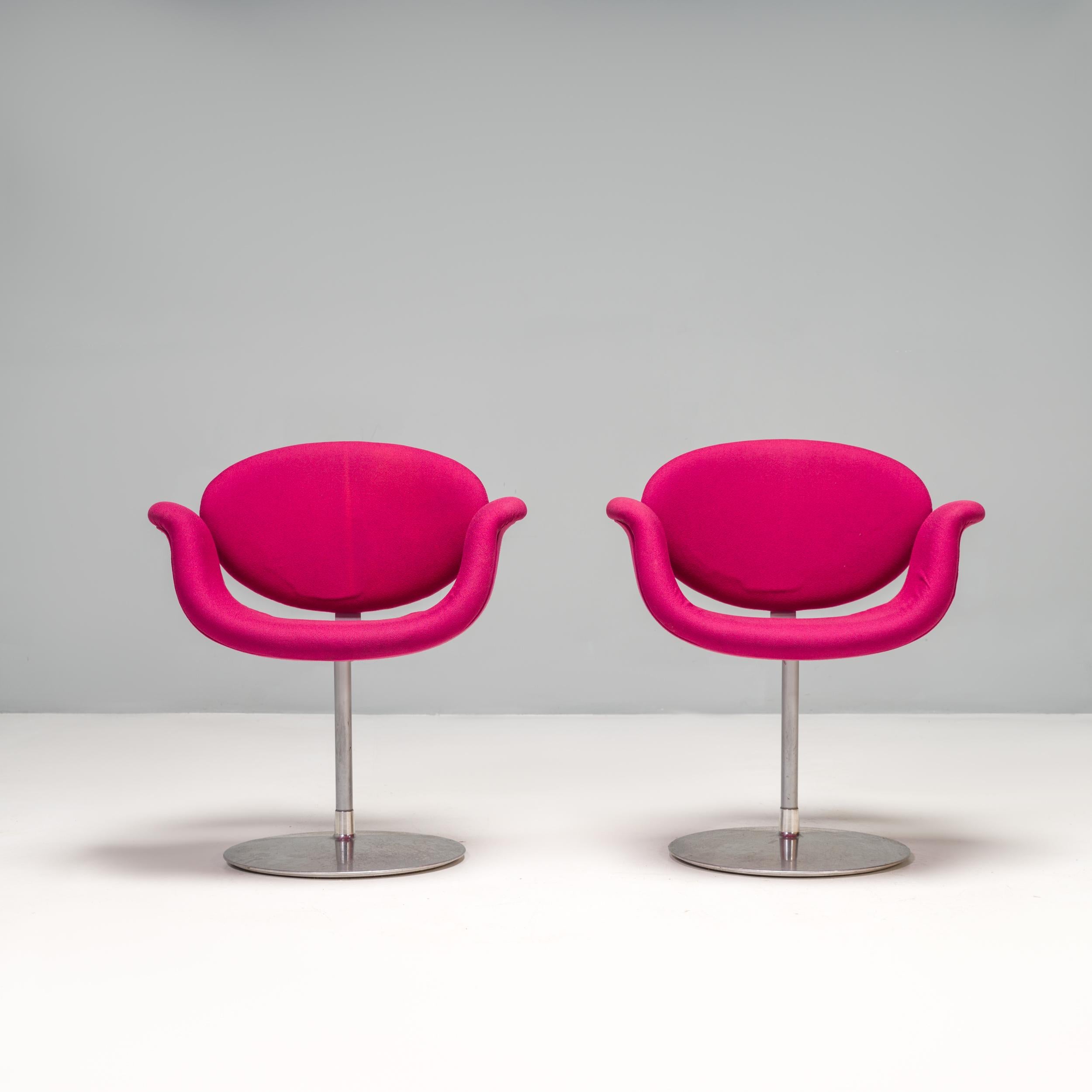 Originally designed by Pierre Paulin in 1965, the Little Tulip chair is a design icon.

Inspired by the flower, the chair has a tulip-esque silhouette with a petal-shaped seat which curves out to create armrests.

Upholstered in pink fabric, the