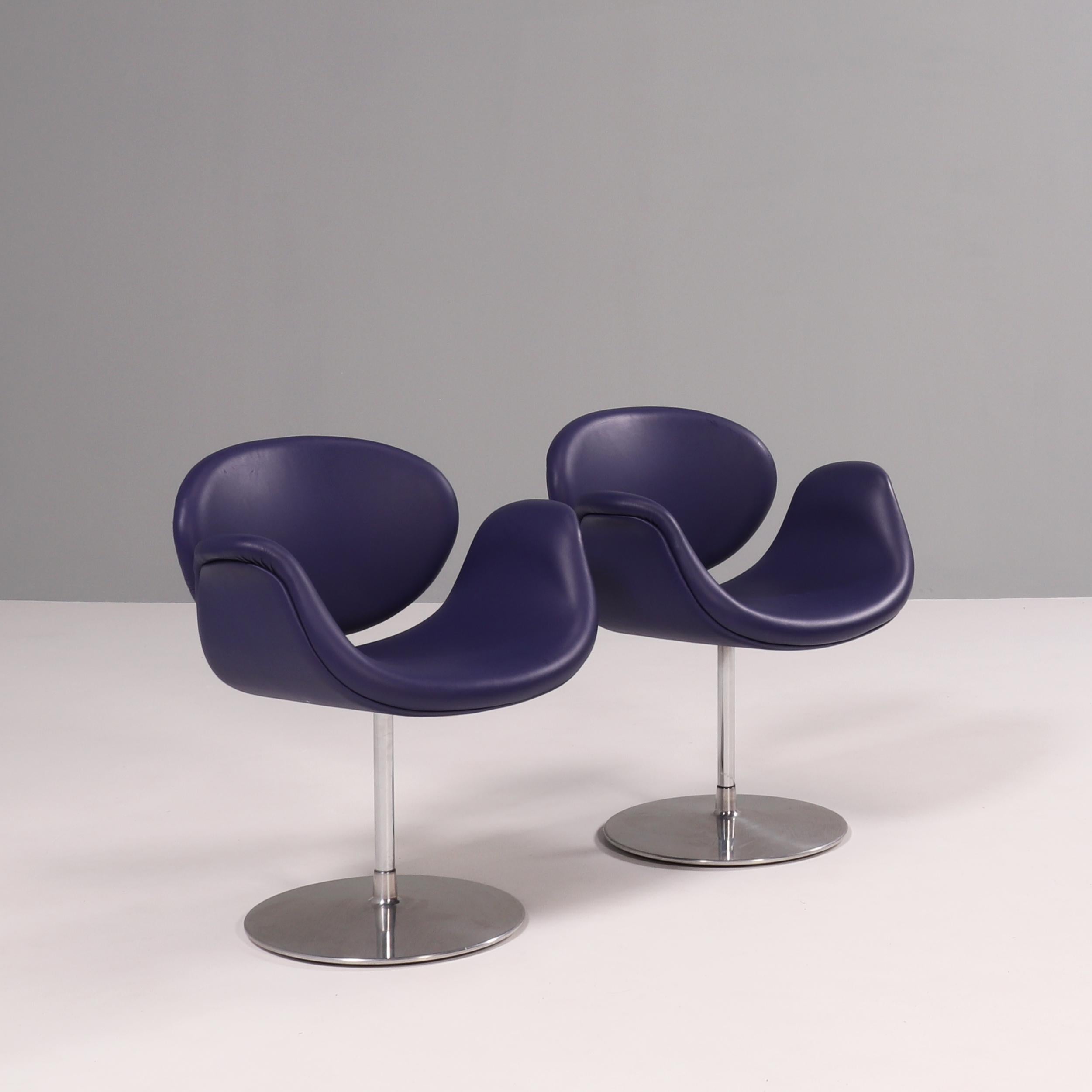 Originally designed by Pierre Paulin in 1965, the Little Tulip chair is a design icon.

Inspired by the flower, the chairs have a Tulip-esque silhouette with a petal shaped seat which curves to create armrests.

Upholstered in purple leather,