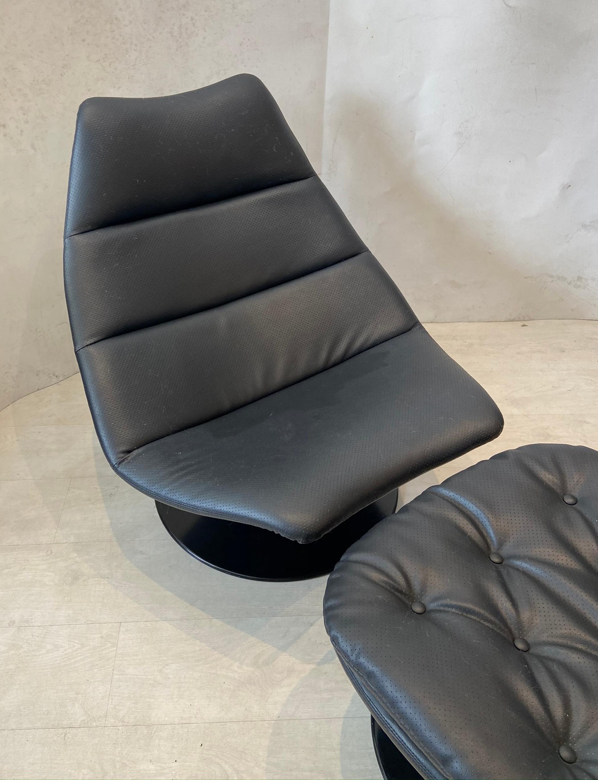Artifort lounge chair with ottoman designed by Geoffrey Harrcourt.