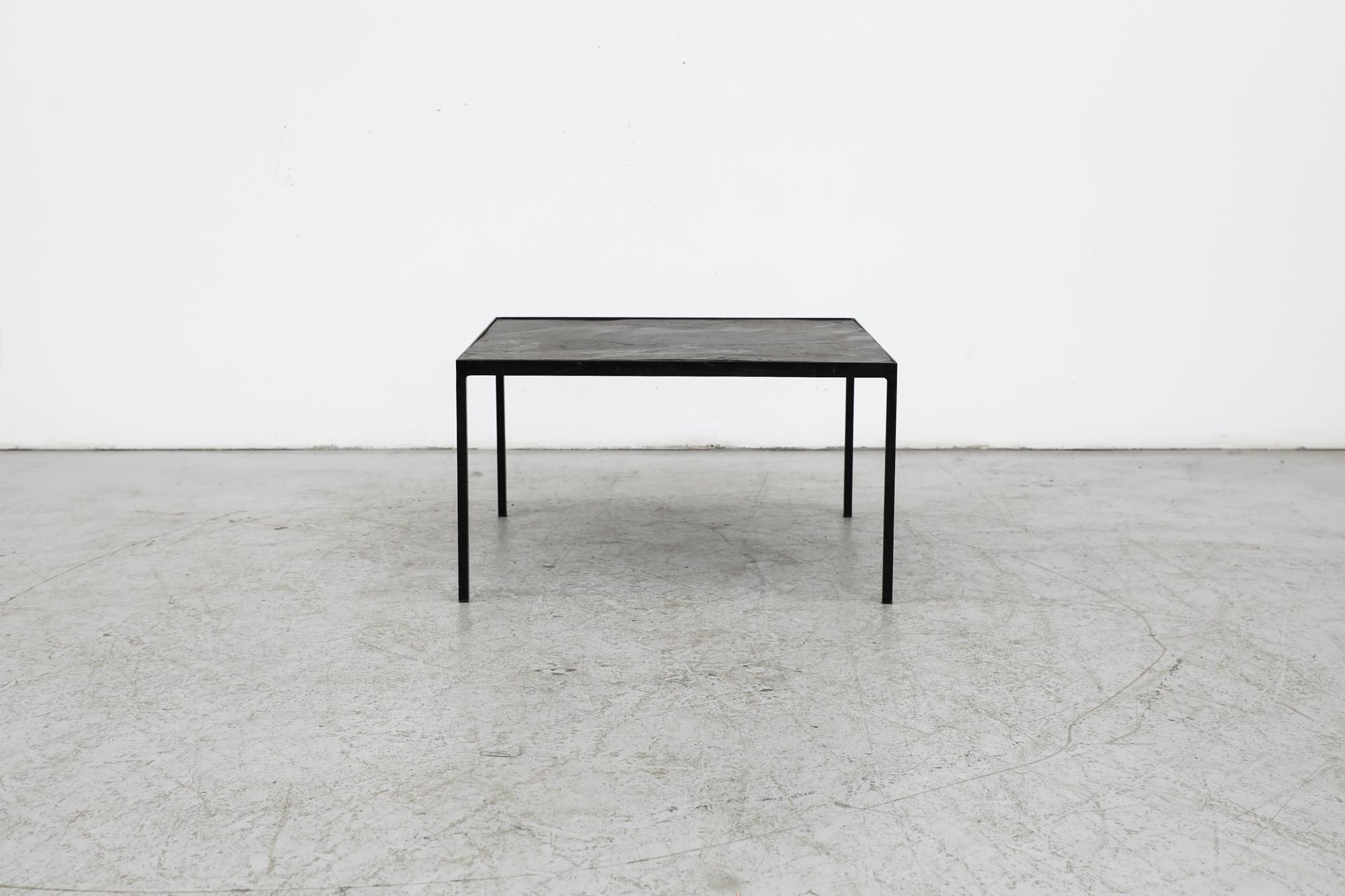 Mid-Century Artimeta Style Inset Square Slate Stone Coffee Table with Back Enameled Metal Frame. In original condition with visible wear including chipping and scratching. Wear is consistent with its age and use.