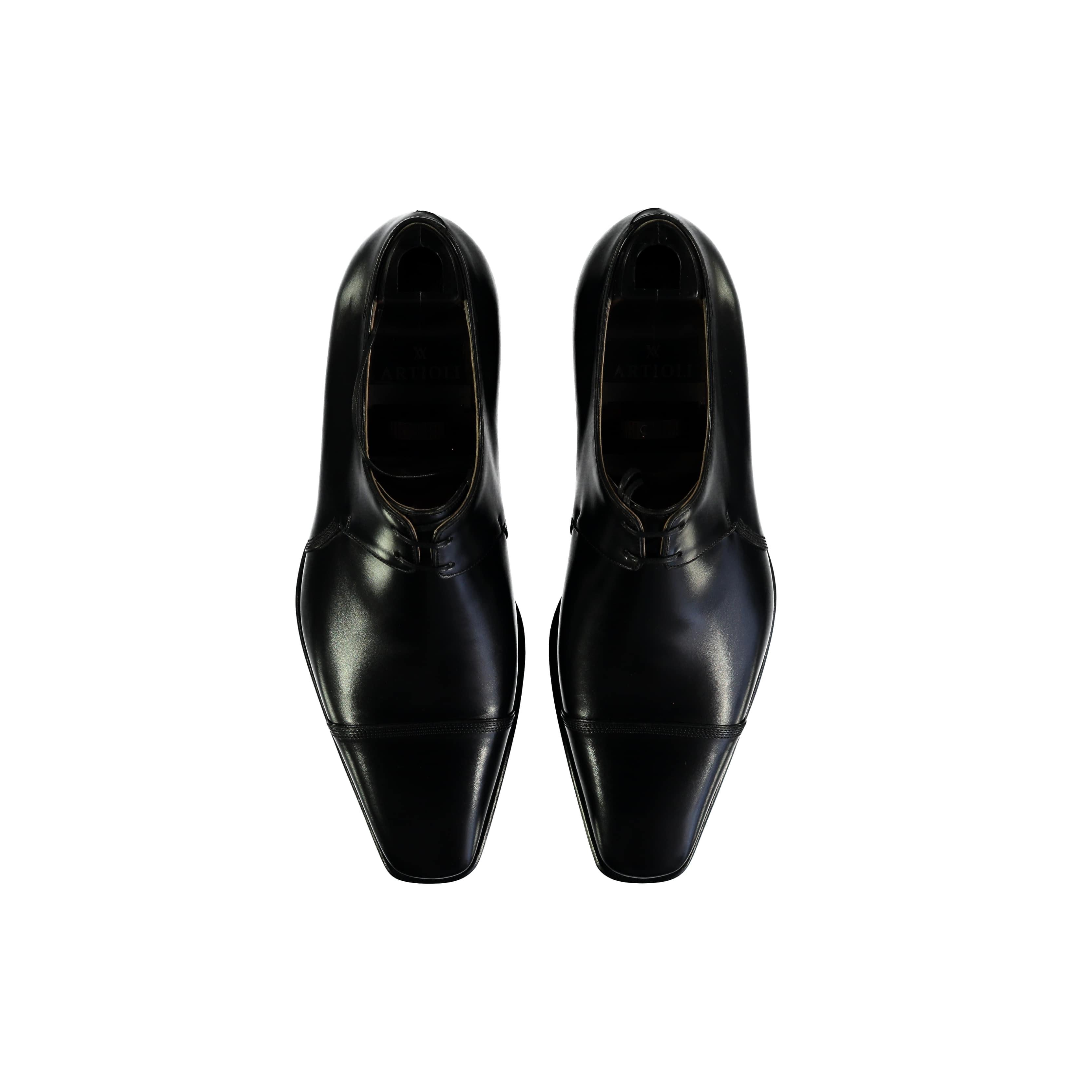 These Artioli black lace-up shoes make a sophisticated choice for any formal event. Handmade with expert craftsmanship from premium leather and featuring a sleek silhouette, these shoes are durable and designed to maintain their shape. 
 Remarks: