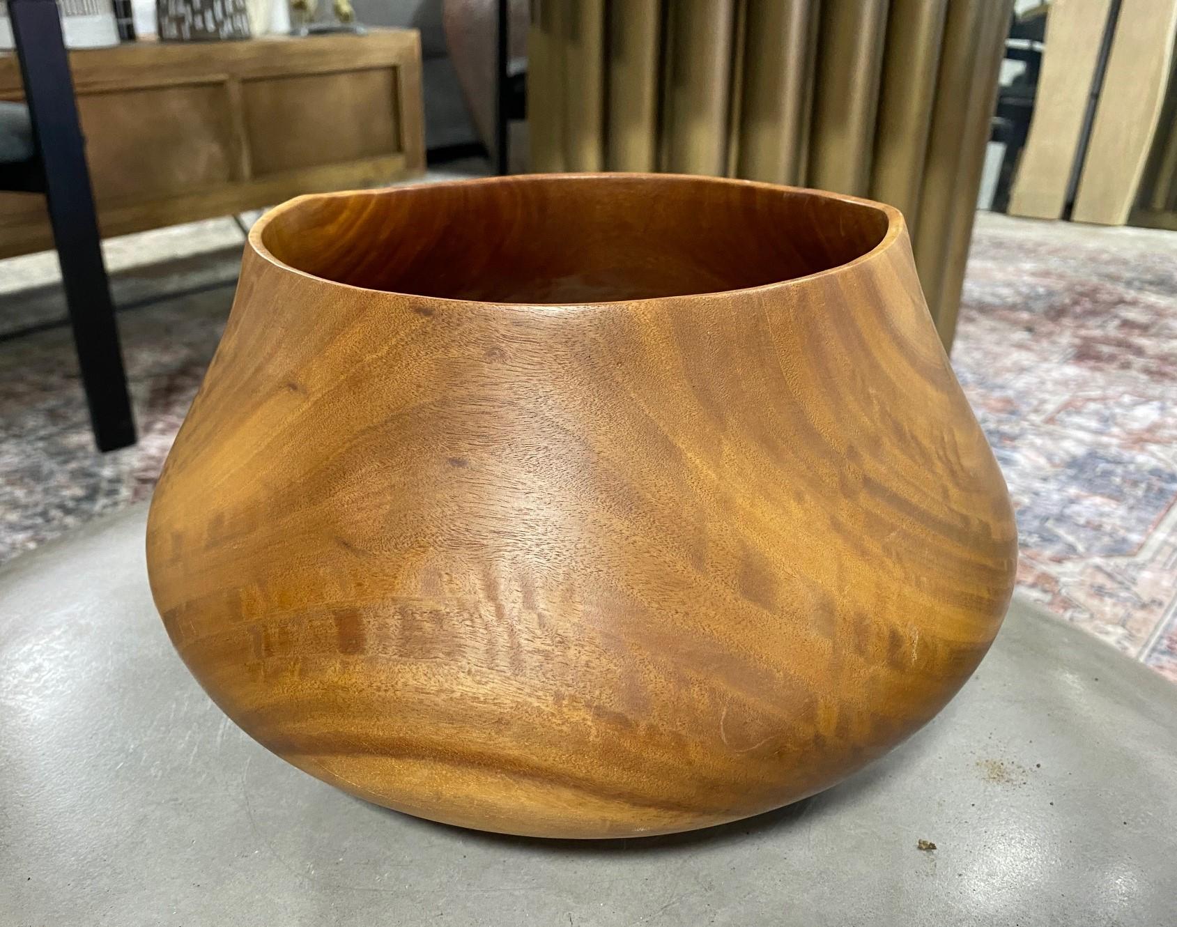 A wonderful work. Clearly made by a master woodturner. Beautiful organic, natural shape and two-tone coloring. This bowl has a great feel and nice heft to it. 

Signed and dated (2009) by the artist on the base. 

Would make for a great addition