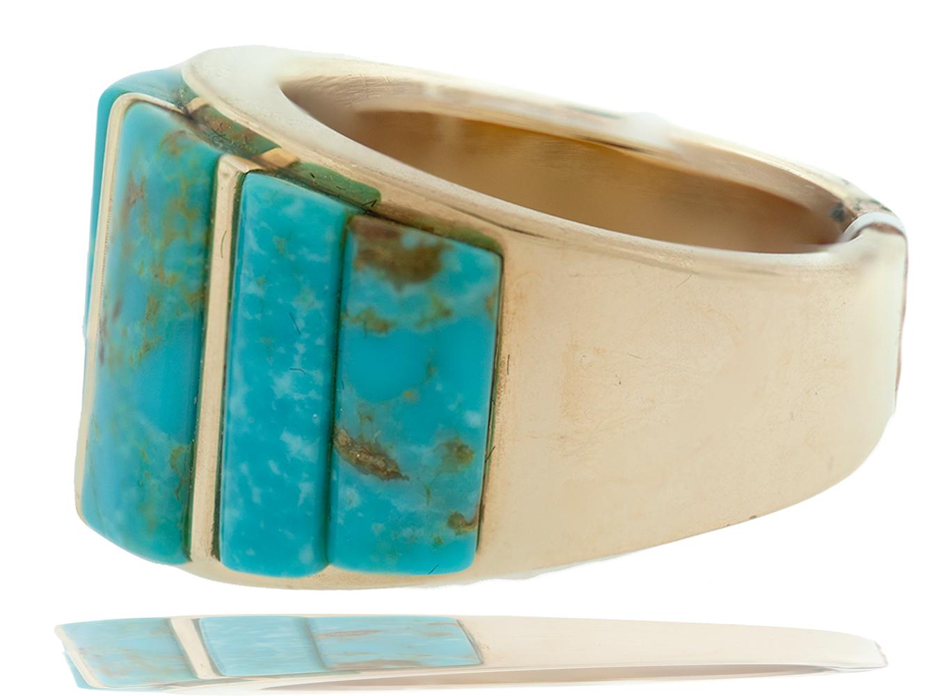 Exquisite, Turquoise, 14 Karat Yellow Gold Wide, Band Ring

Dome shaped and graduated rectangular, convex and beveled shaped turquoise are set in a graduating band. Measuring 15.20 mm wide band to 13mm ending at the stones the ring is lovely on the