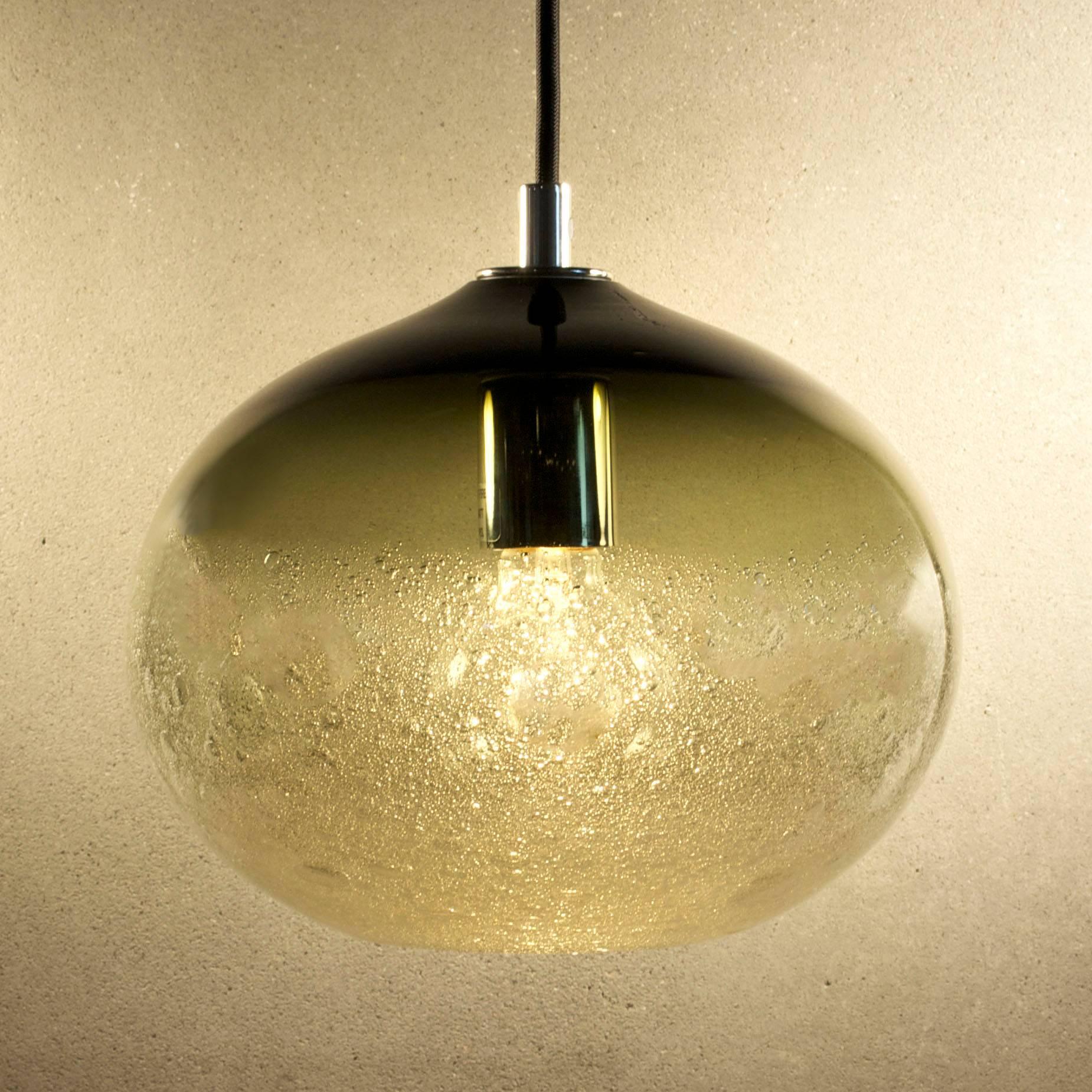 Blown Glass Shade - Bronze Ellipse Bubble Pendant • Hand Blown Glass • Made in USA
Various Cord, Canopy, and Shade Color Options Available

These works continue the language of contrast of the lattimo and banded lines but use with a swath of