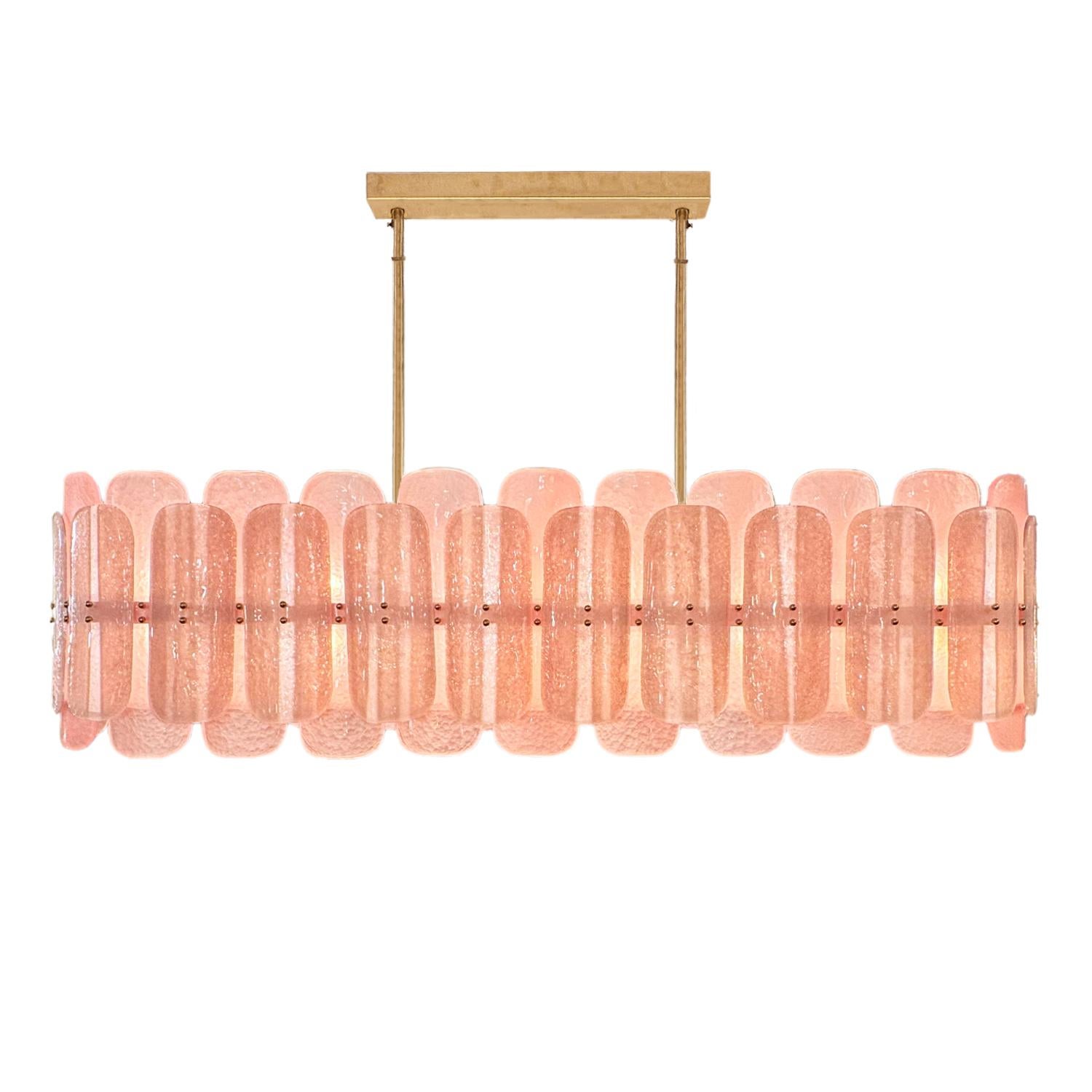 Elegant linear Murano glass tile chandelier with un-lacquered brass frame and canopy. Each gently curved and overlapping glass tile is fastened to the frame with two matched finish ball finials. An opaque glass diffuser running the length of the