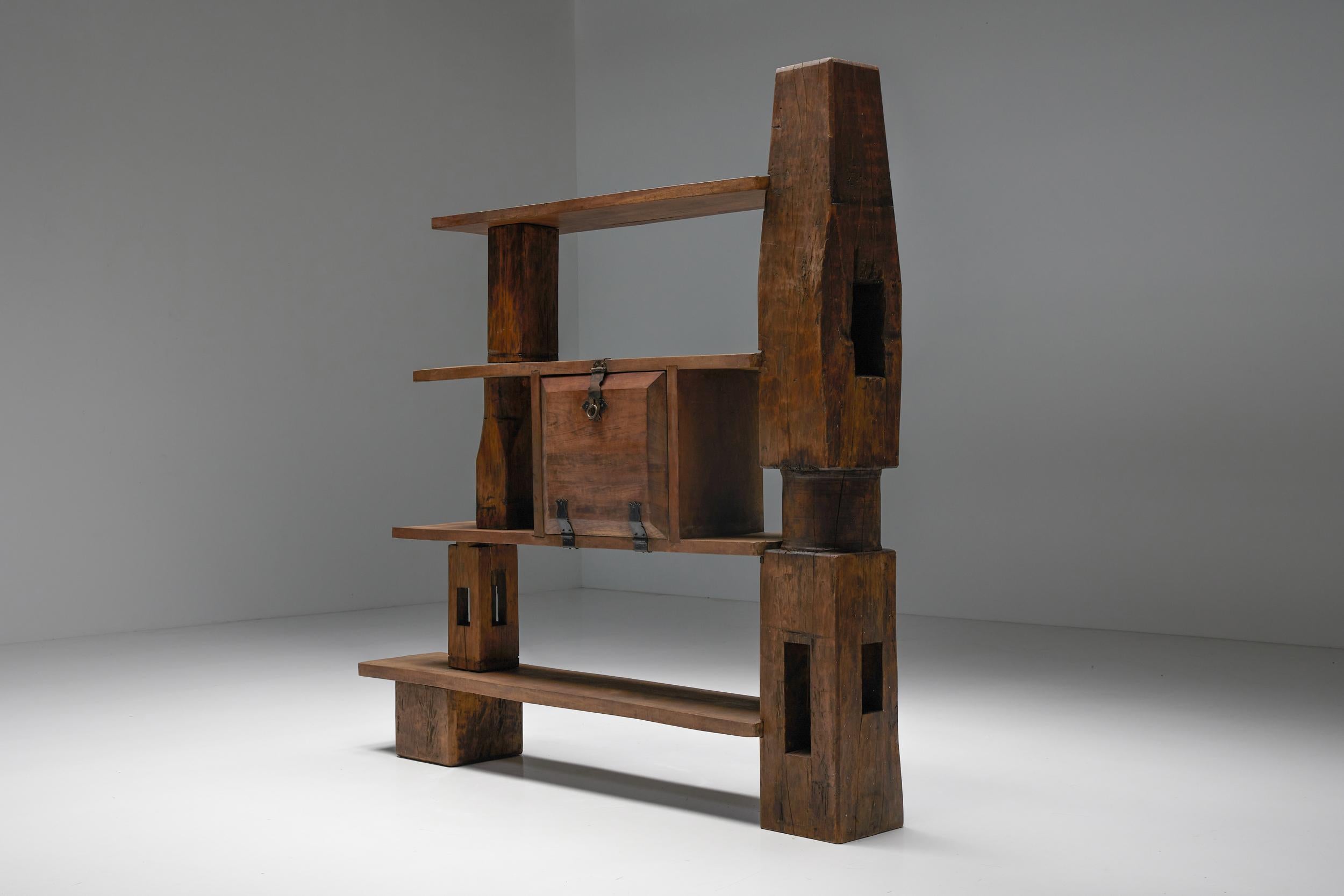 Rustic; Asymmetrical; Bookshelf; Room Divider Unit; Artisan; Wood; 1950s;

A Mid-Century Modern artisan bookshelf, made of solid wood and exceptionally well crafted. This asymmetrical bookcase can also be used as a room divider unit. The unit is