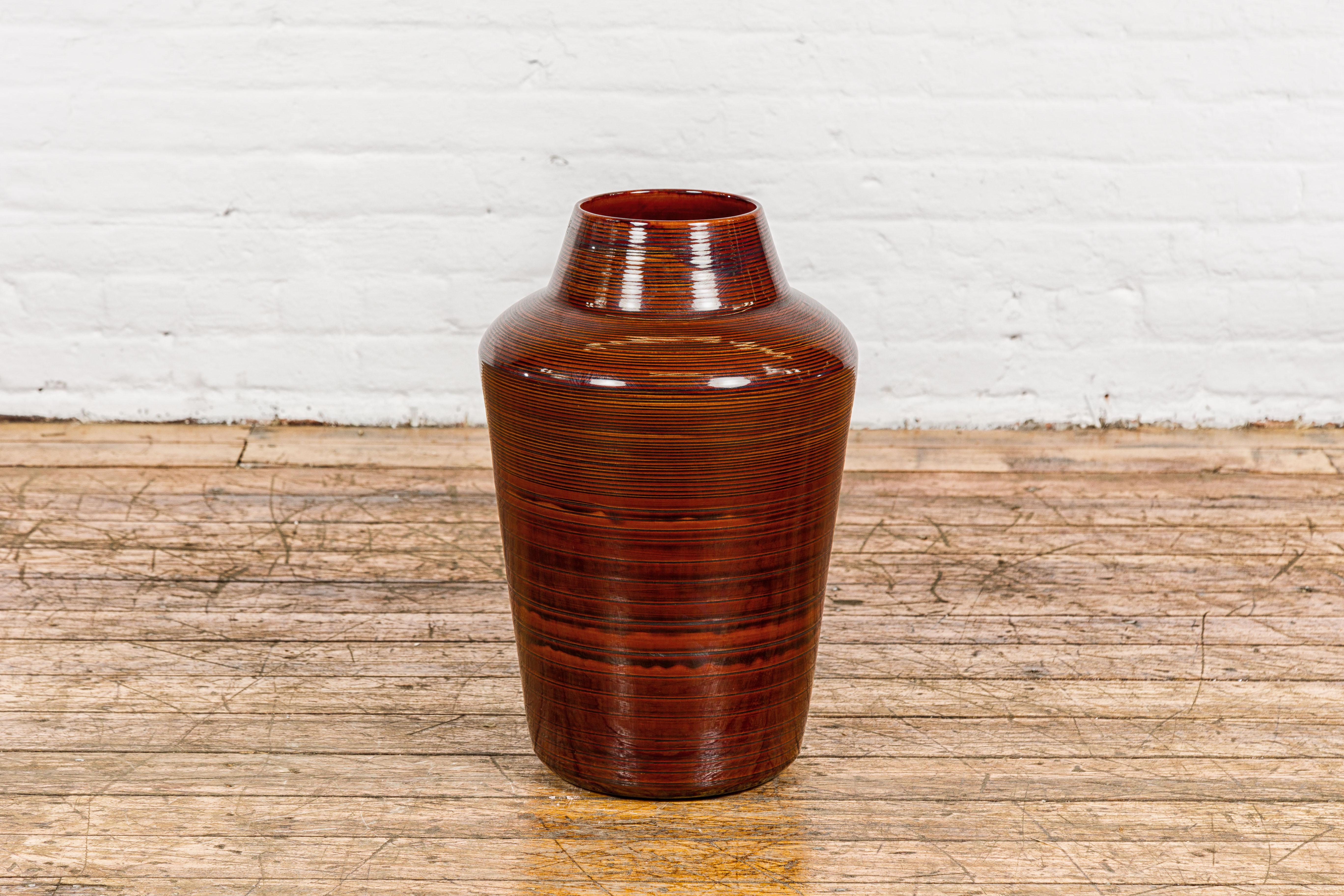 Glazed Artisan Brown Glaze Vase with Black Concentric Motifs and Tapering Lines For Sale