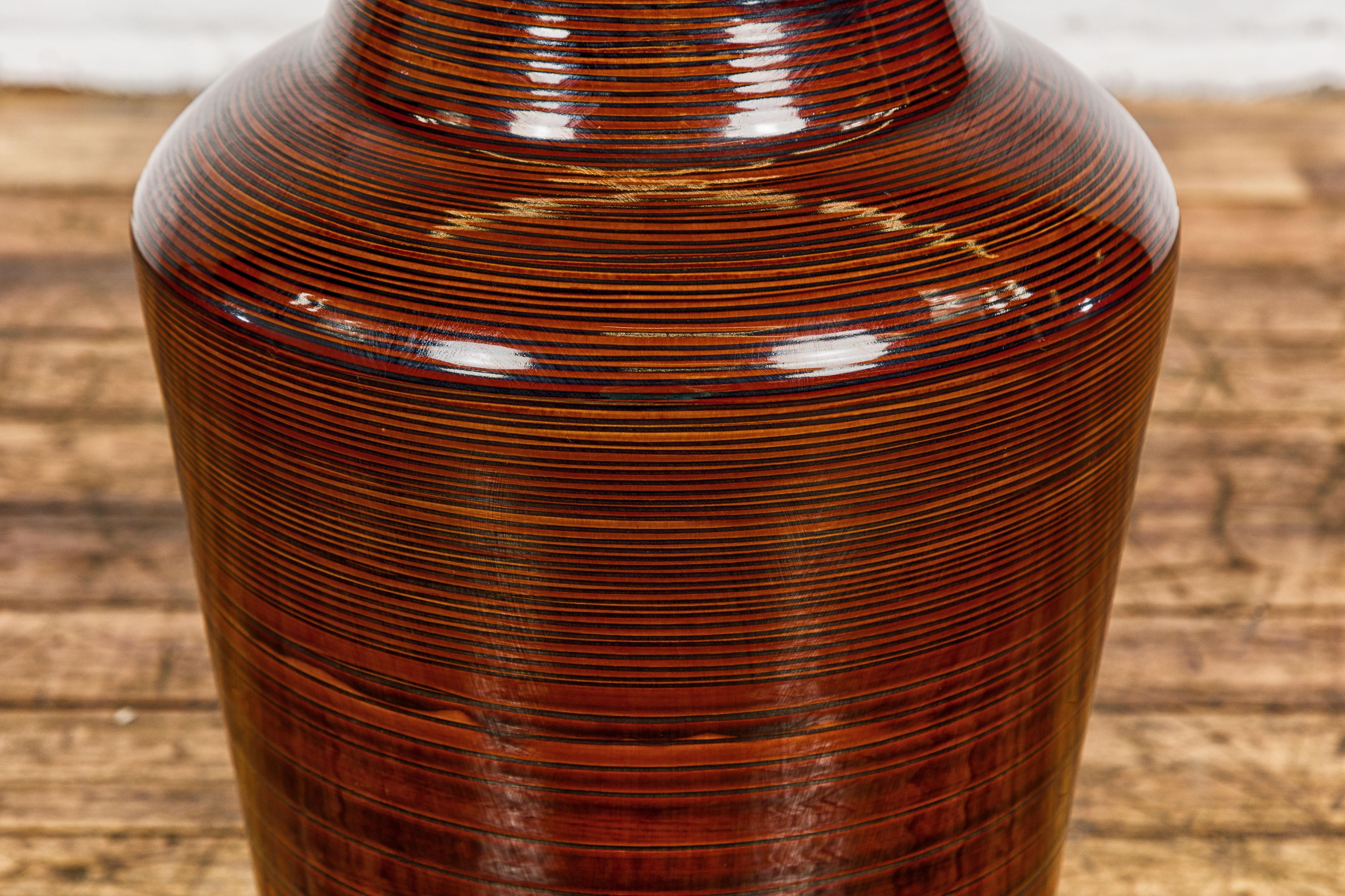 Ceramic Artisan Brown Glaze Vase with Black Concentric Motifs and Tapering Lines For Sale