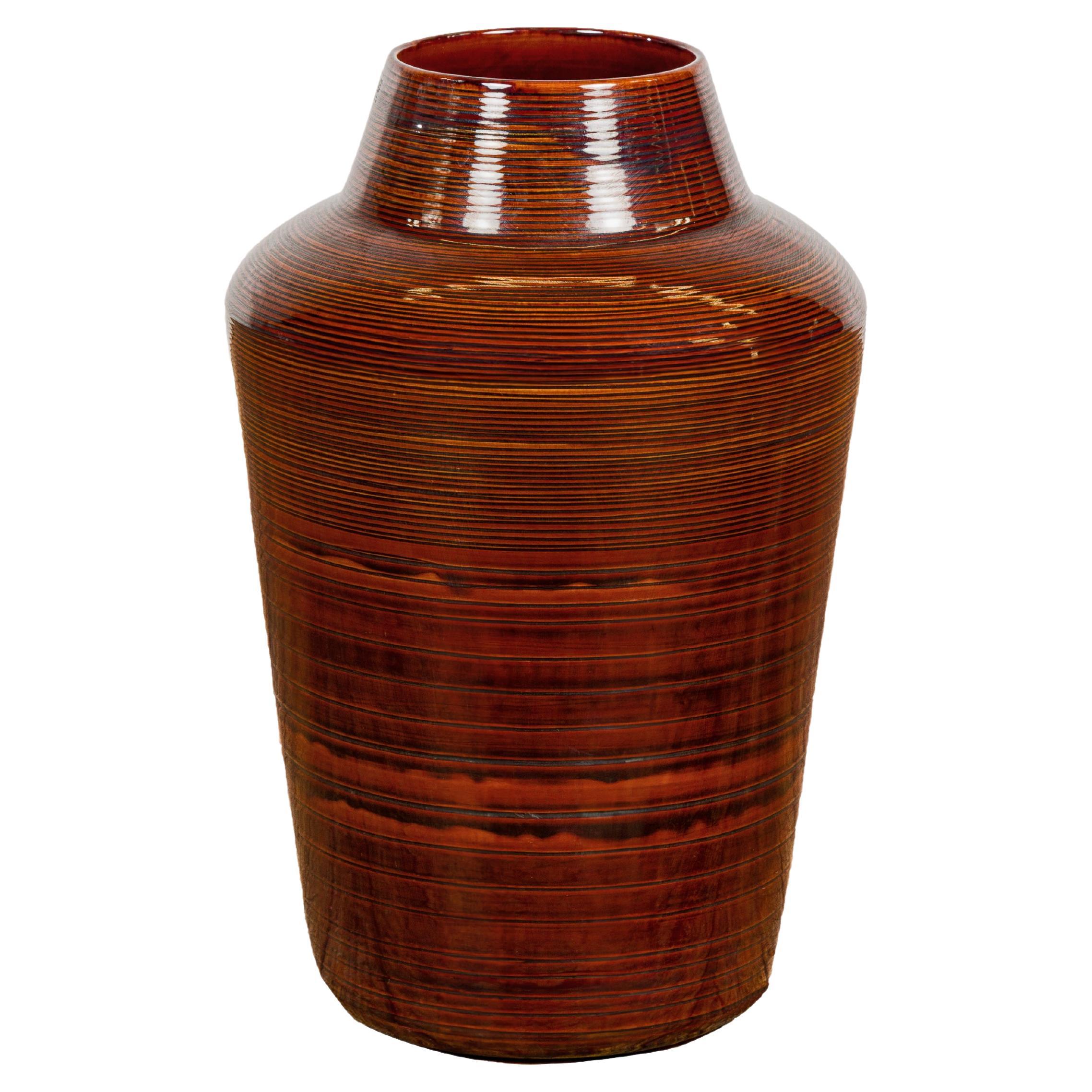 Artisan Brown Glaze Vase with Black Concentric Motifs and Tapering Lines For Sale