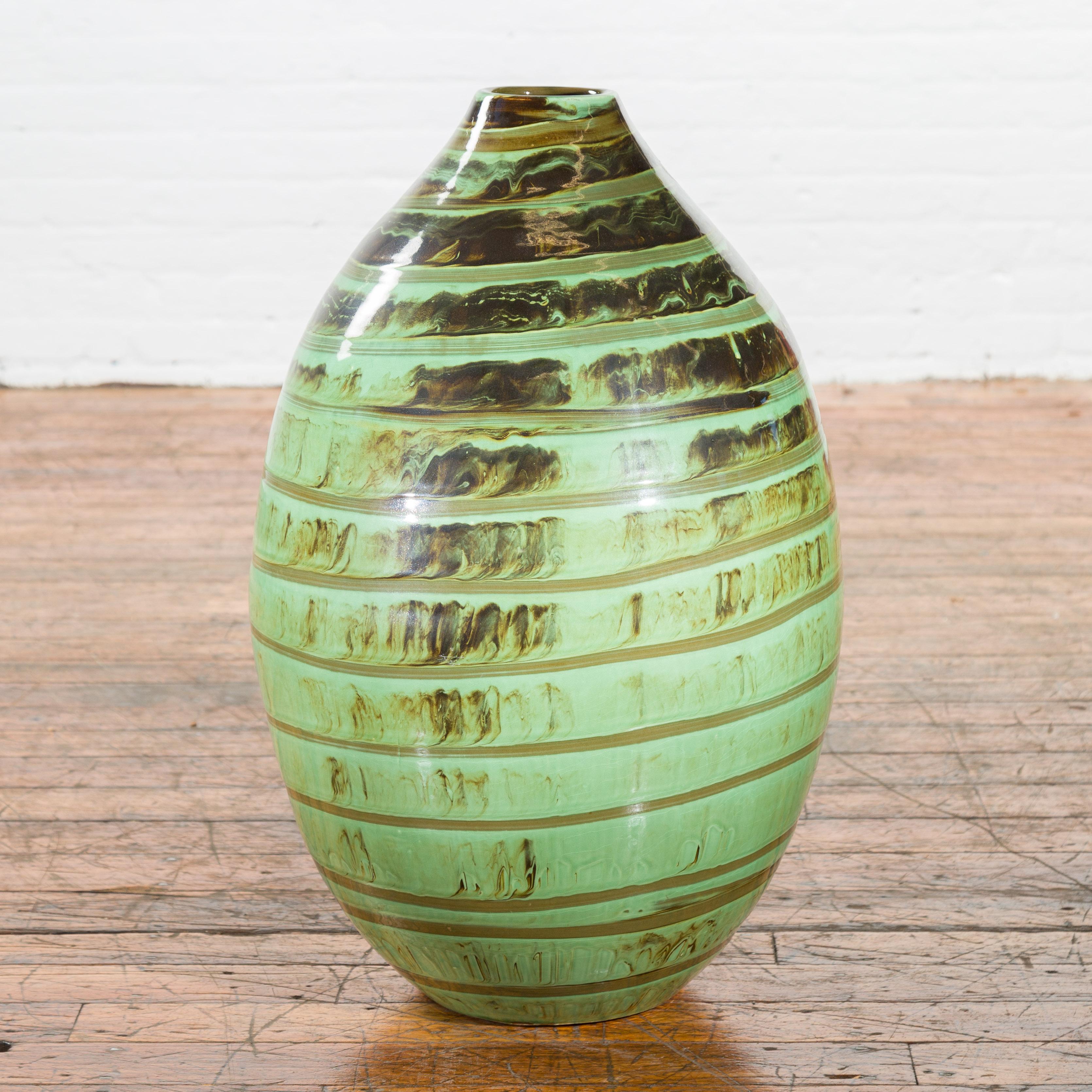 Glazed Large Olive-Shaped Ceramic Vase with Spiraling Green and Brown Glaze For Sale