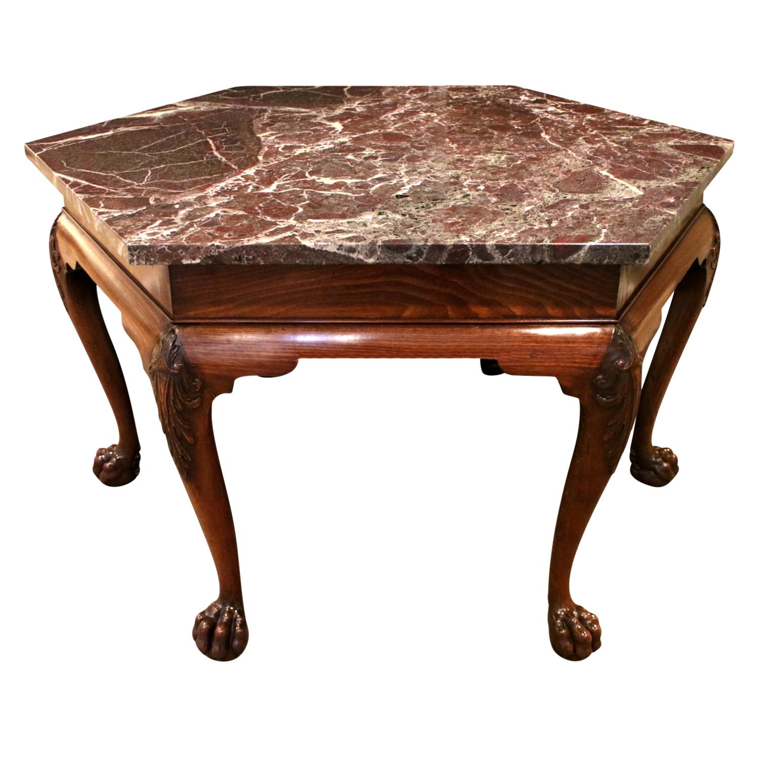 Exceptional hand-crafted Chippendale center/hall table, hexagonal with cabriole legs and claw feet with exquisitely carved details and figured marble top, America 18th Century. This table is rare and special.